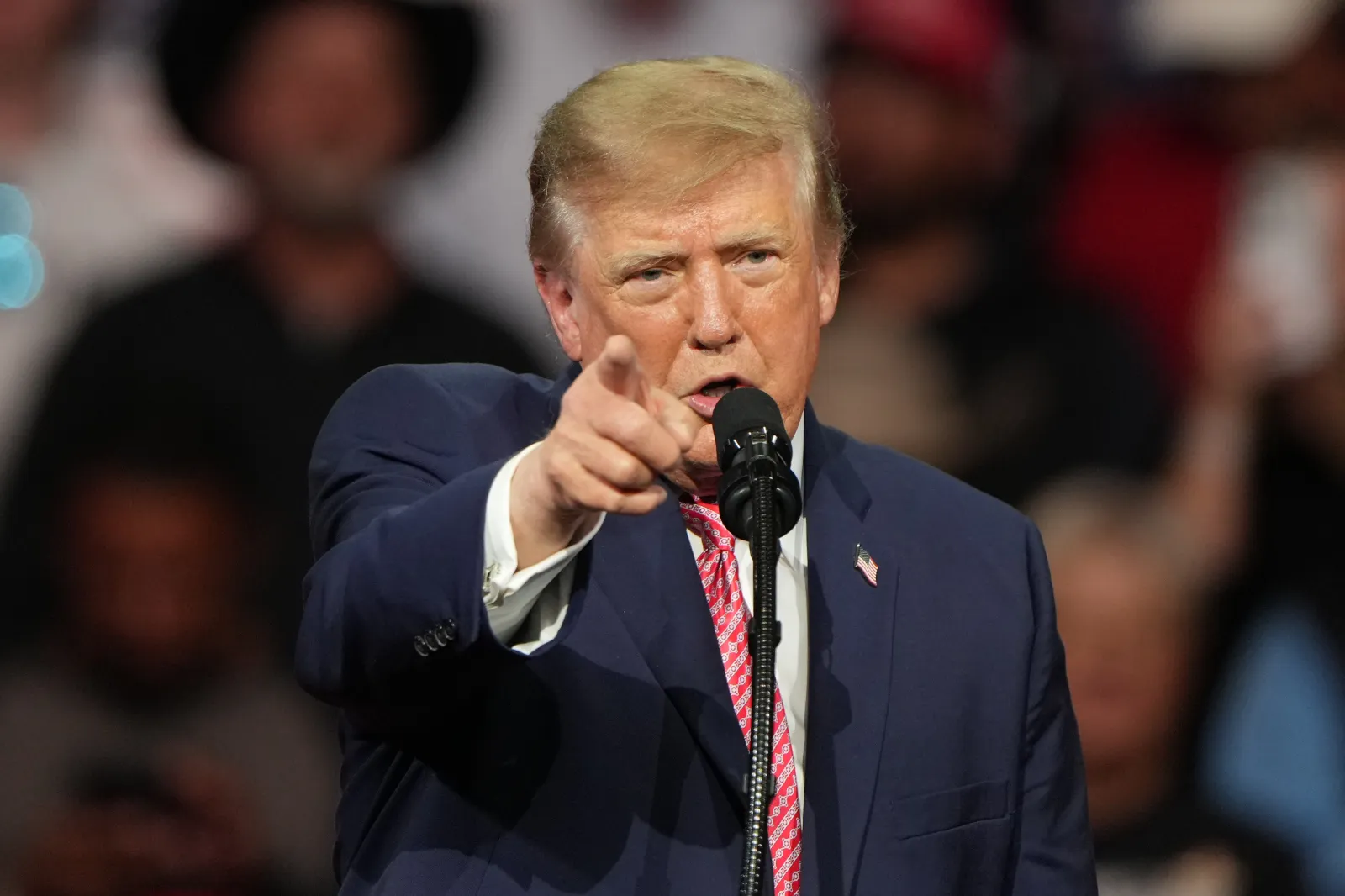 President Donald Trump speaks at a campaign rally at Heartland Credit Union Arena on Monday in Park City, Kansas. (AP Photo/Charlie Riedel)