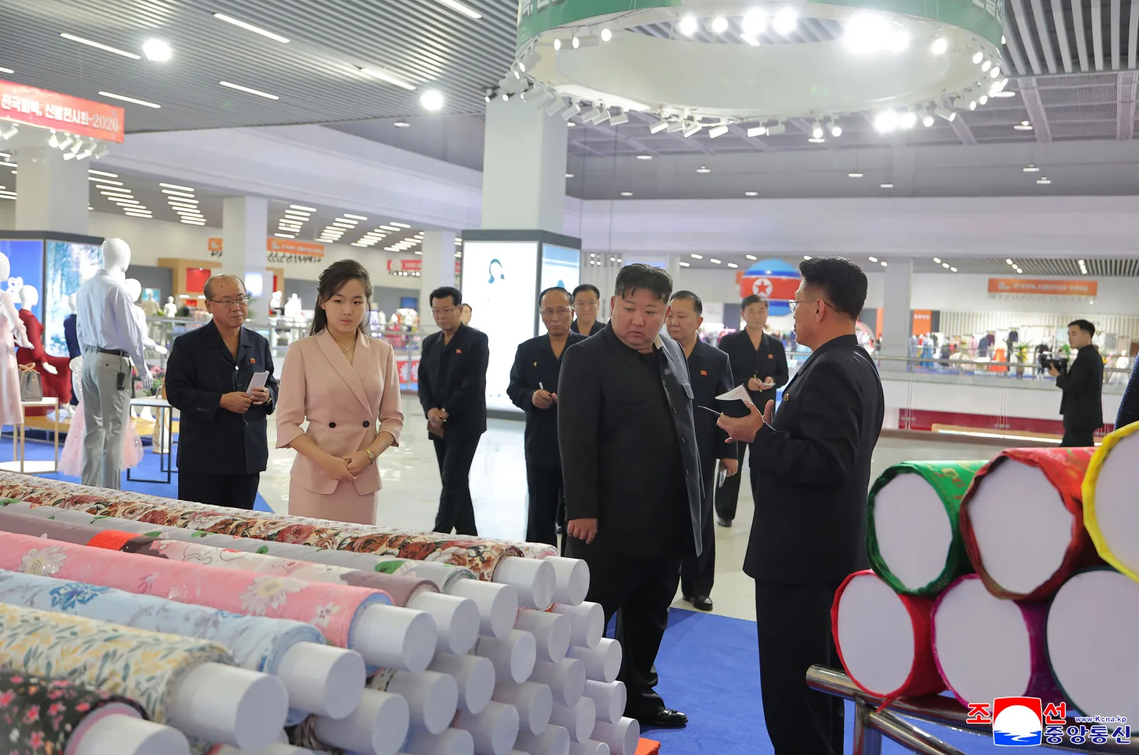 Kim Jong Un, second right in front, and his daughter, second left, visit a garment and footwear exhibition in Pyongyang, North Korea, on October 19, according to KCNA.
