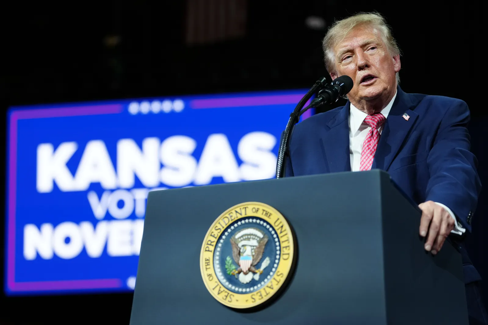 President Donald Trump speaks at a campaign rally at Heartland Credit Union Arena on Monday in Park City, Kansas. (AP Photo/Julia Demaree Nikhinson)