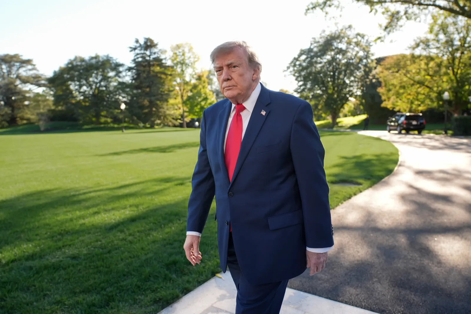 President Donald Trump arrives to speak with reporters before departing on Marine One from the South Lawn of the White House on Wednesday in Washington, D.C. (AP Photo/J. Scott Applewhite)