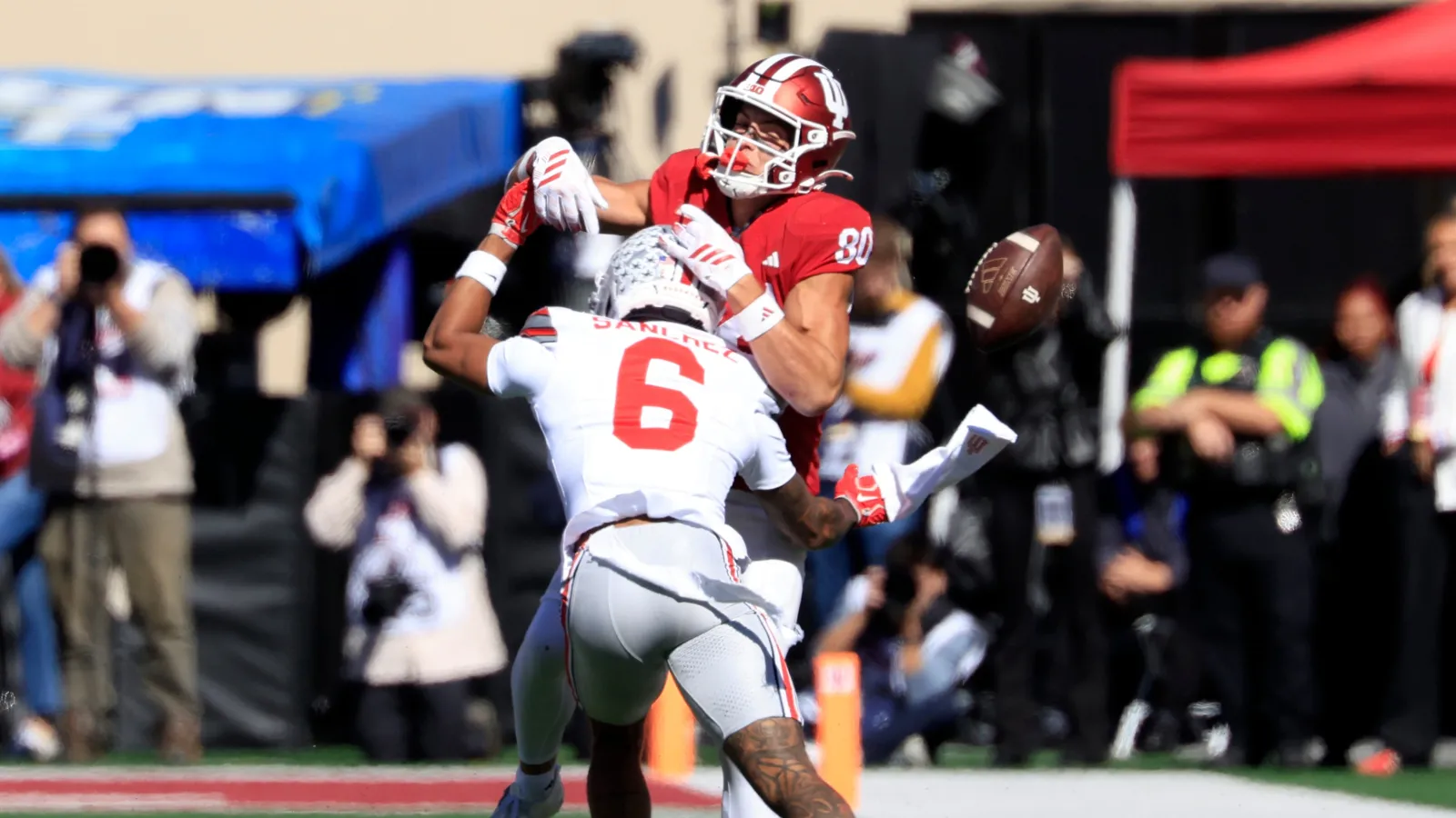 Devin Sanchez #6 of the Ohio State Buckeyes breaks up a pass intended for Charlie Becker #80 of the Indiana Hoosiers