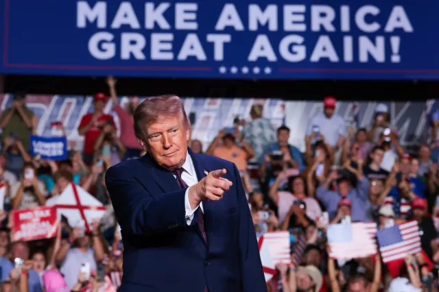 Trump provides update on $5,000 check, warns of disaster under Democrats 2 Donald Trump arrives onstage for a campaign rally in the Mitchell Center at the University of South Alabama on October 02, 2026 in Mobile, Alabama.