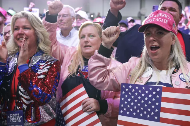 : People cheer as U.S. President Donald Trump speaks on stage during an election rally at the Oncenter on October 09, 2026 in Syracuse, New York.