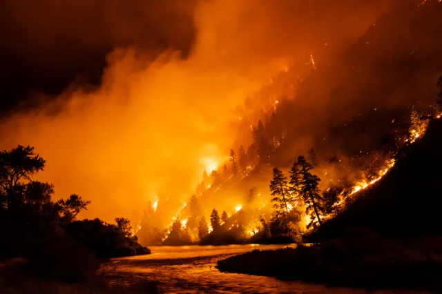 The Moose fire burns on July 23, 2022, in North Fork, Idaho.