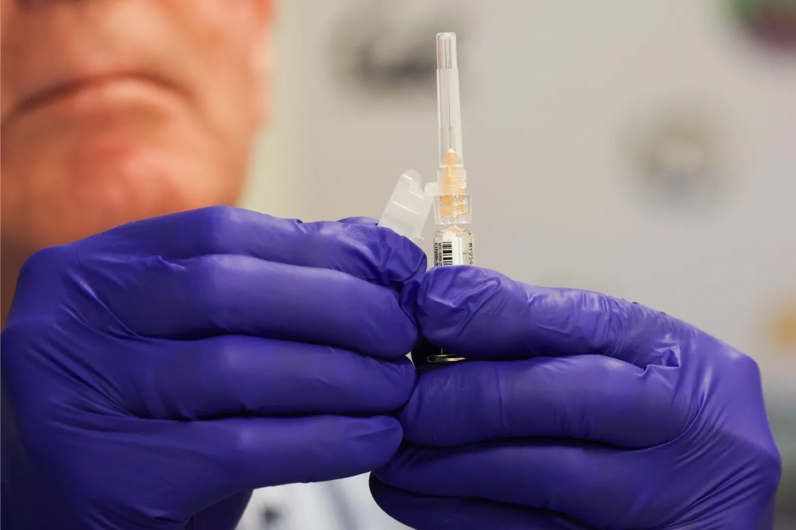 File photo: a pharmacist prepares a shot of the Pfizer-BioNTech COVID-19 vaccine in Los Angeles on October 24, 2025.