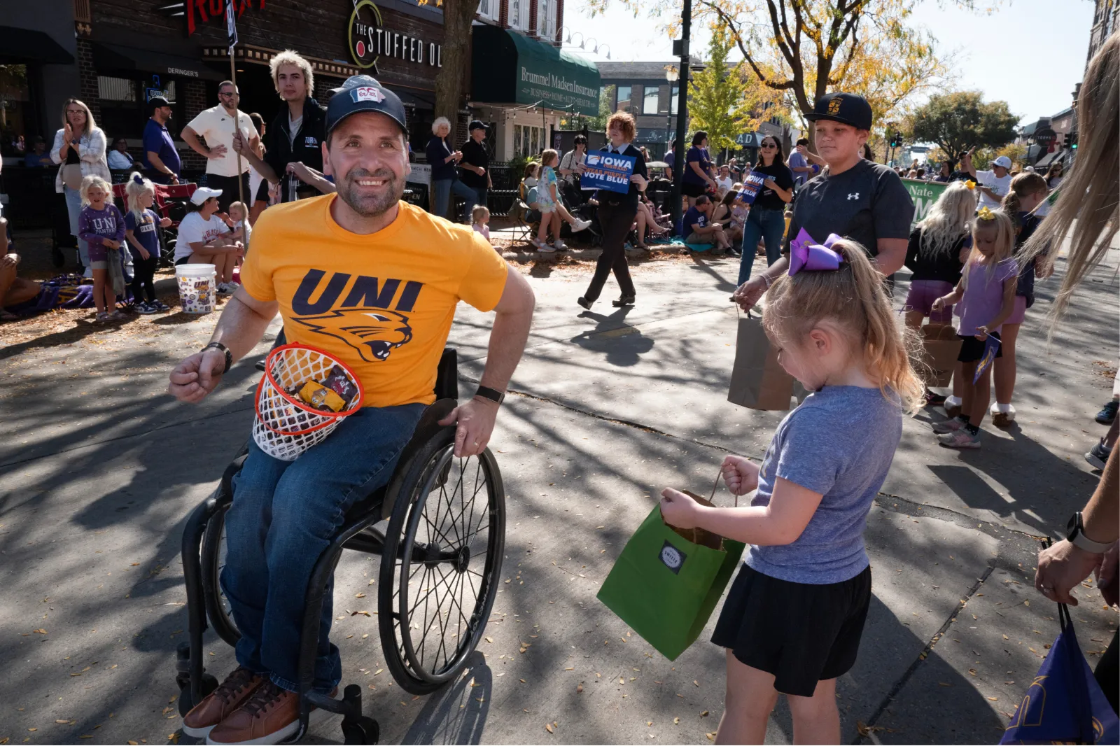 Iowa Democrat candidate for U.S. Senate Josh Turek participates in the University of Northern Iowa (UNI) homecoming parade on October 10, 2026 in Cedar Falls, Iowa.