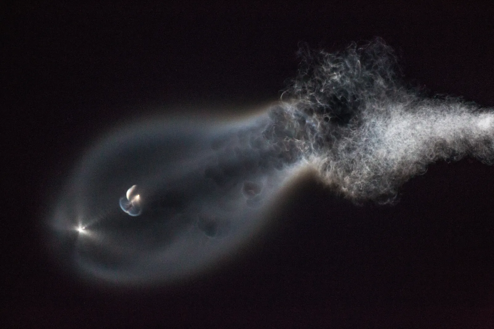 The contrail from a SpaceX Falcon 9 rocket launched at Vandenberg Air Force Base lights up the early evening sky on December 22, 2017, as viewed from Solvang, California.