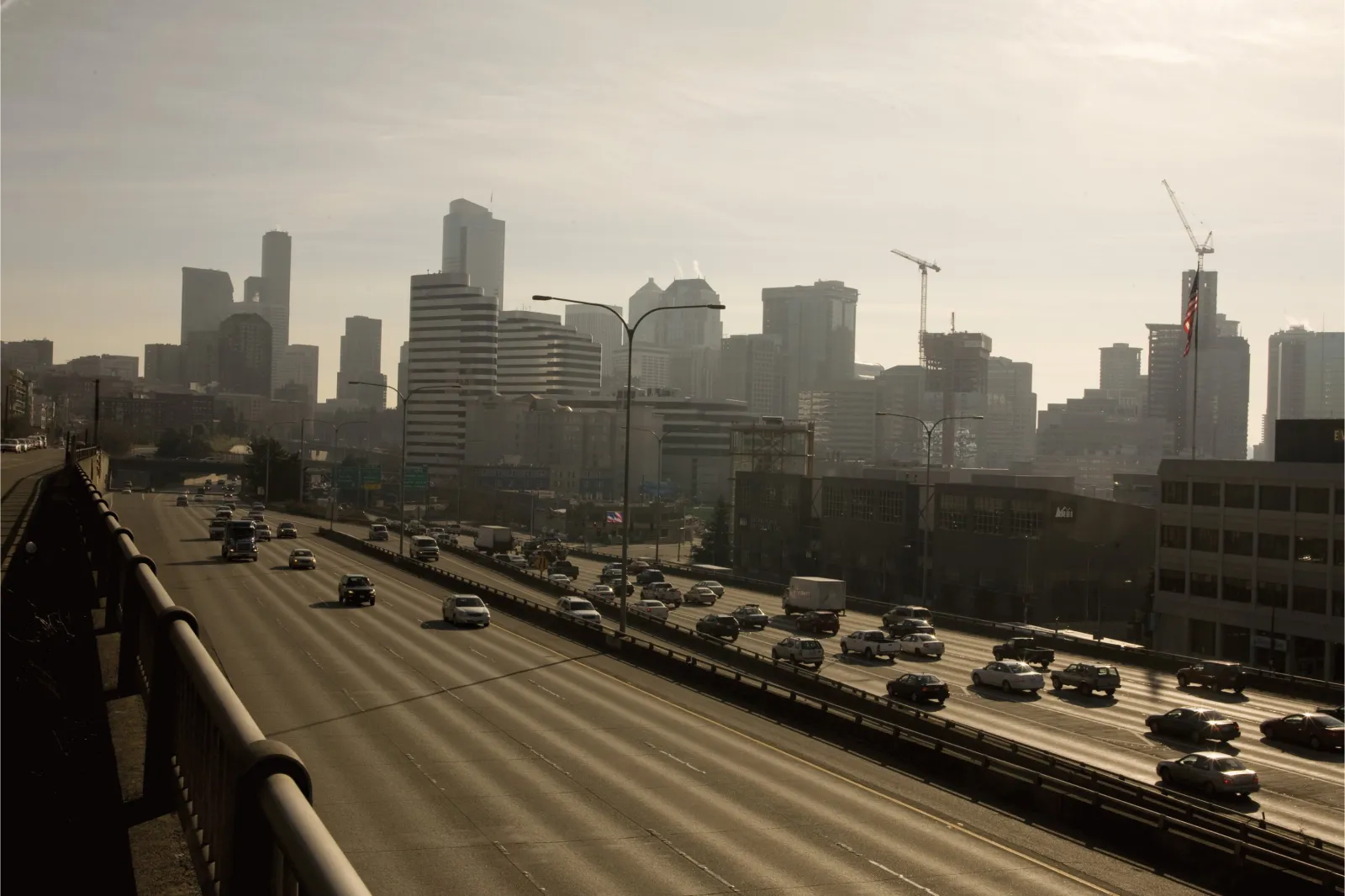 Seattle's downtown city center high rise office buildings adjacent to Interstate highway 5 in the distance are seen in this 2009 Seattle, Washington, city landscape photo.