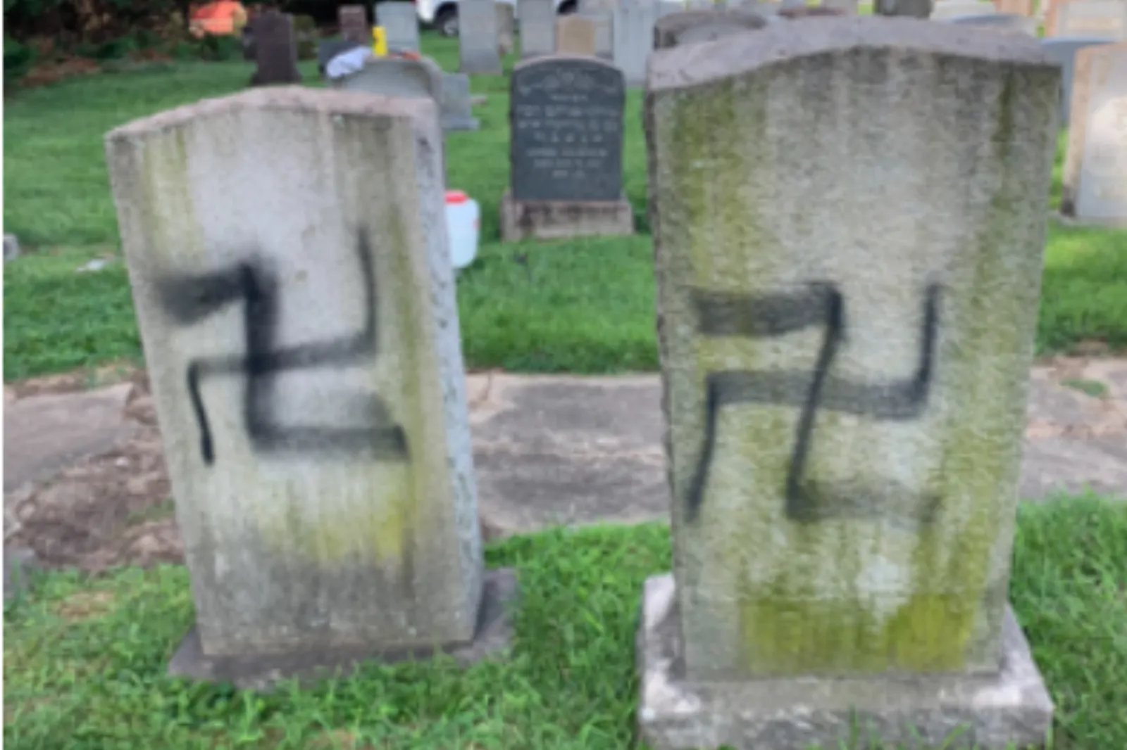 Defaced gravestones at the Ohr Knesseth Israel Anshe Sfard Cemetery, in a press release from the U.S. Attorney’s Office for the District of Maryland.