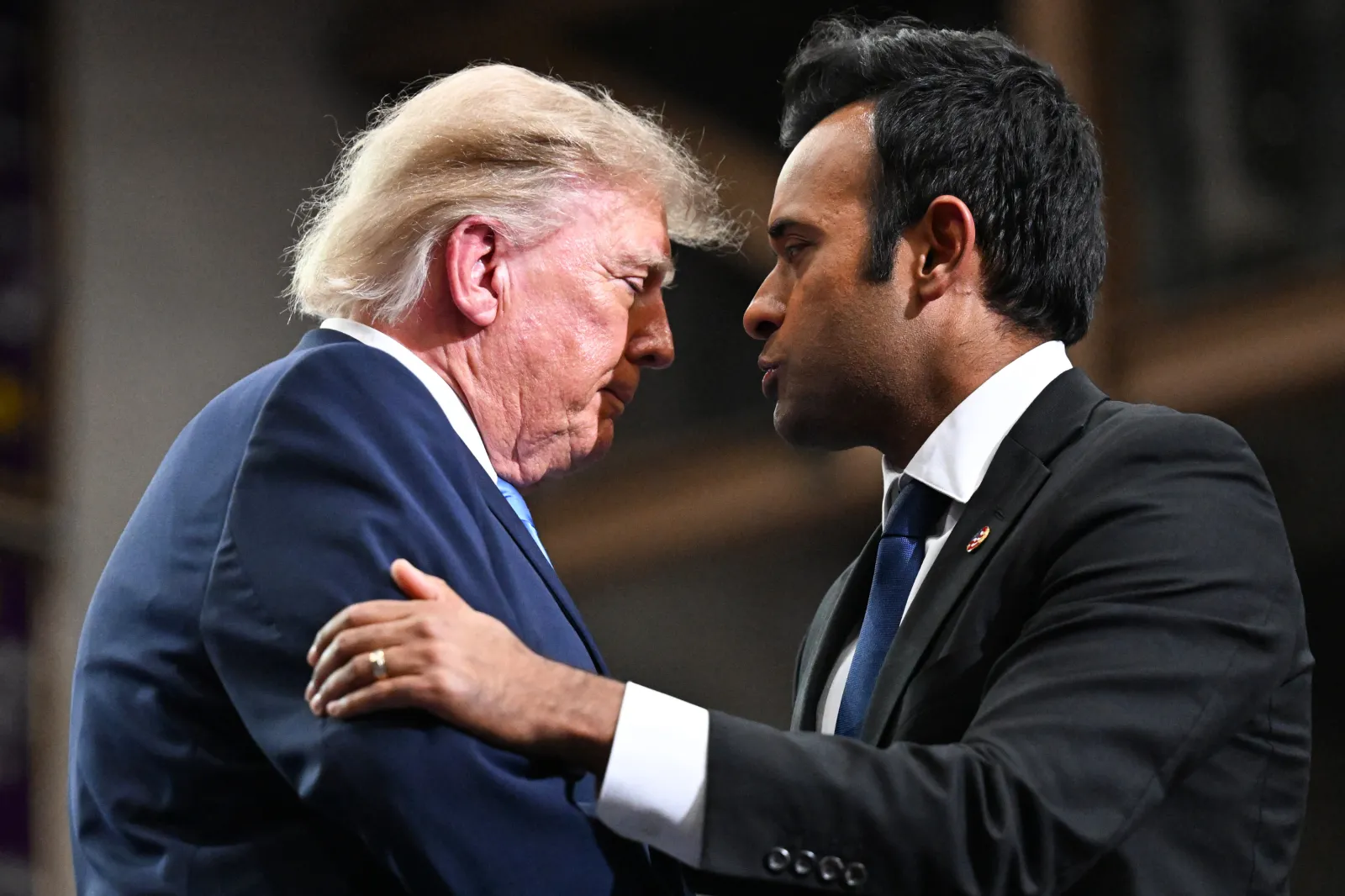 U.S. President Donald Trump greets Ohio Republican gubernatorial candidate, Vivek Ramaswamy on stage at the Butler-Vandalia Student Activity Center during a campaign rally on October 03, 2026 in Vandalia, Ohio.