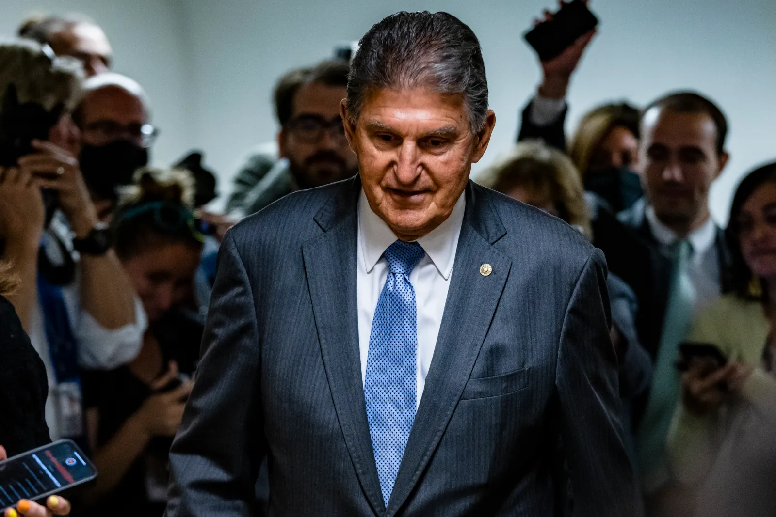 Former Senator Joe Manchin speaks to reporters at the U.S. Capitol in Washington, D.C., on June 8, 2021. Manchin has warned Democrats against prioritizing investigations if they regain congressional power.