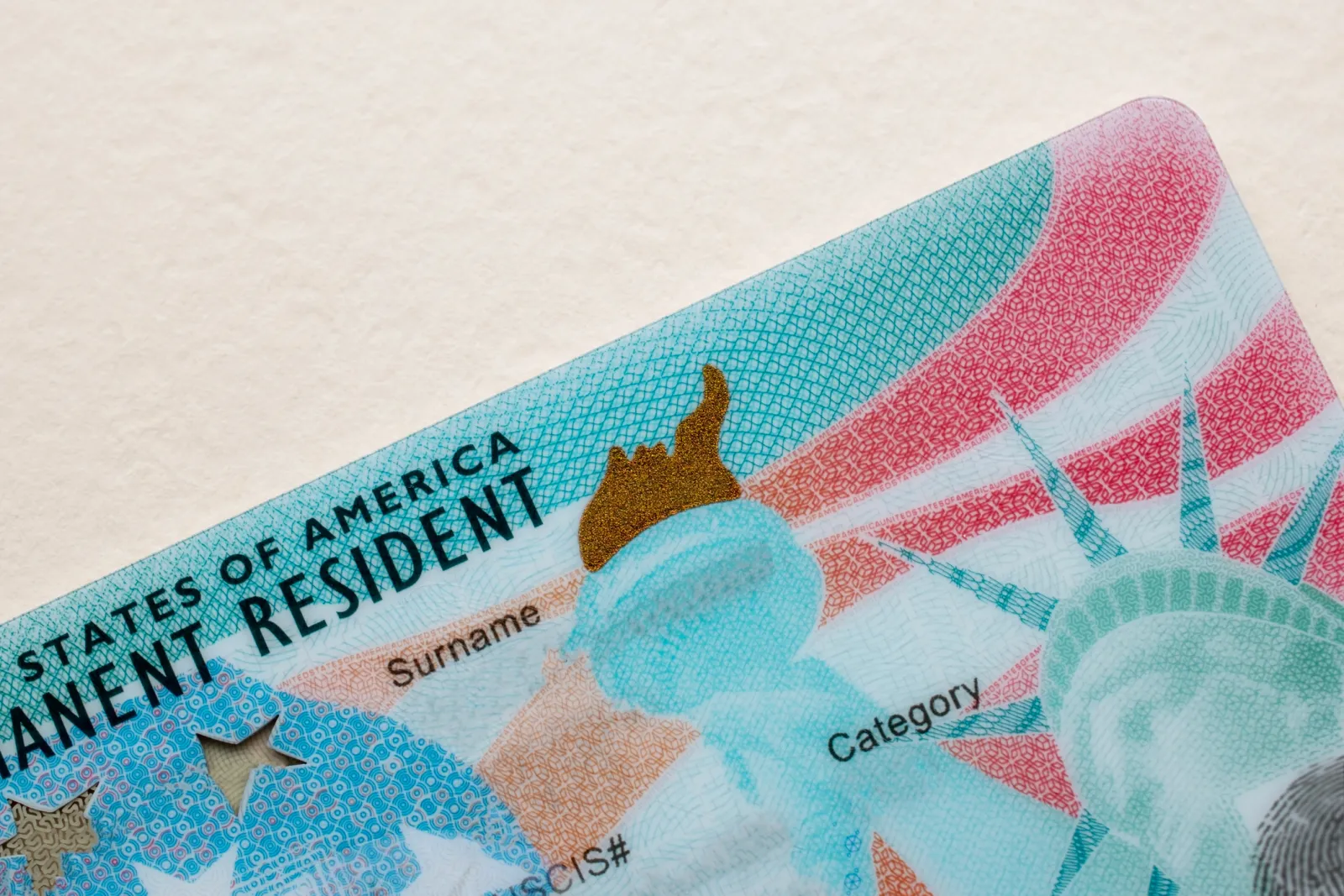 Stock image shows a permanent resident card, also known as a green card.