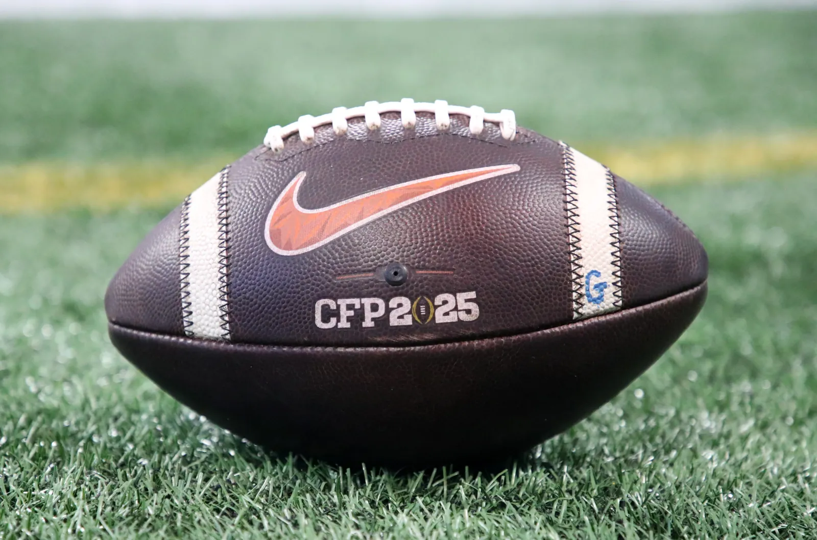 A Texas Longhorns CFP 2025 football.