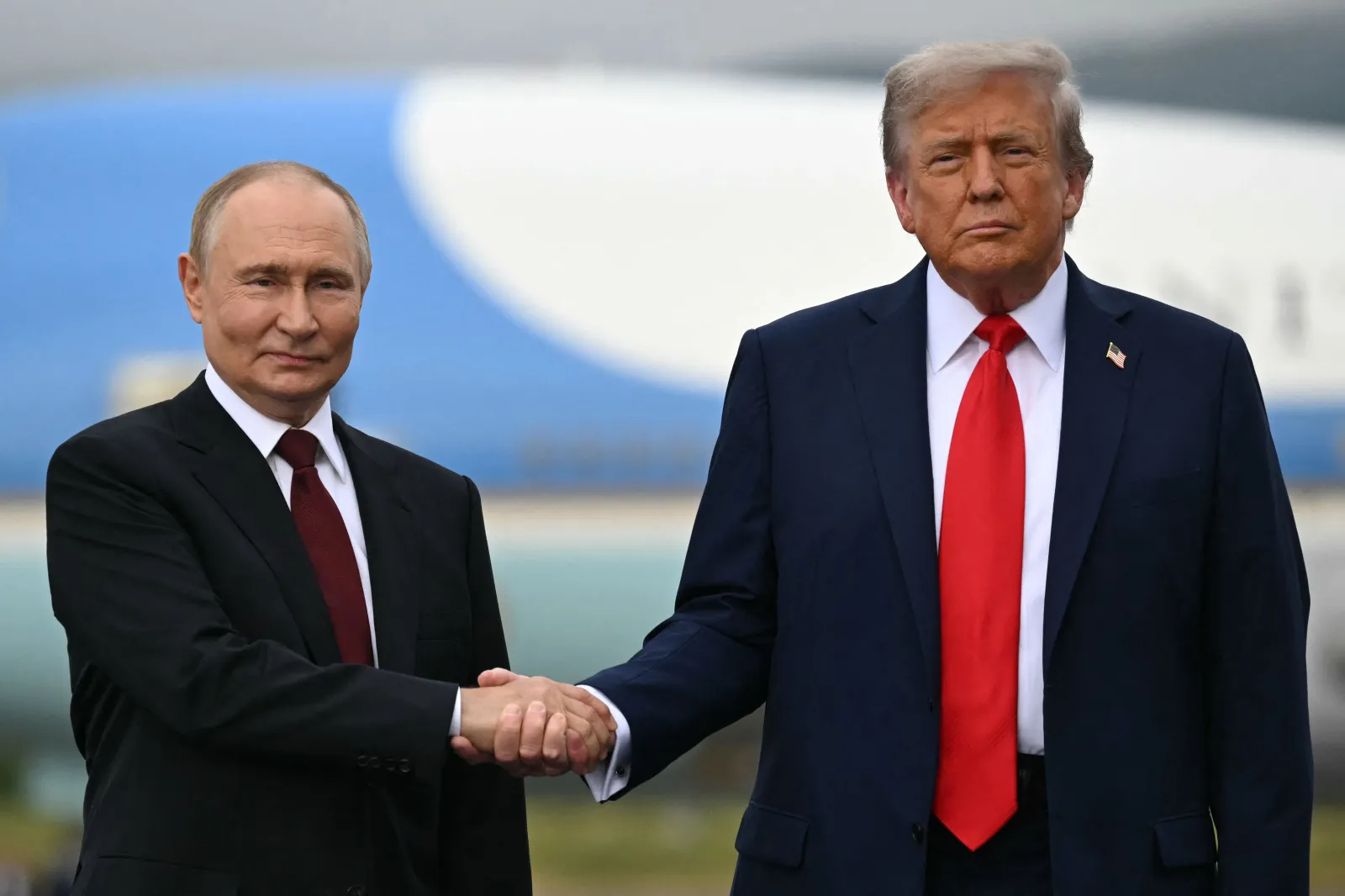 President Donald Trump and Russian President Vladimir Putin shake hands in Alaska on August 15, 2025.