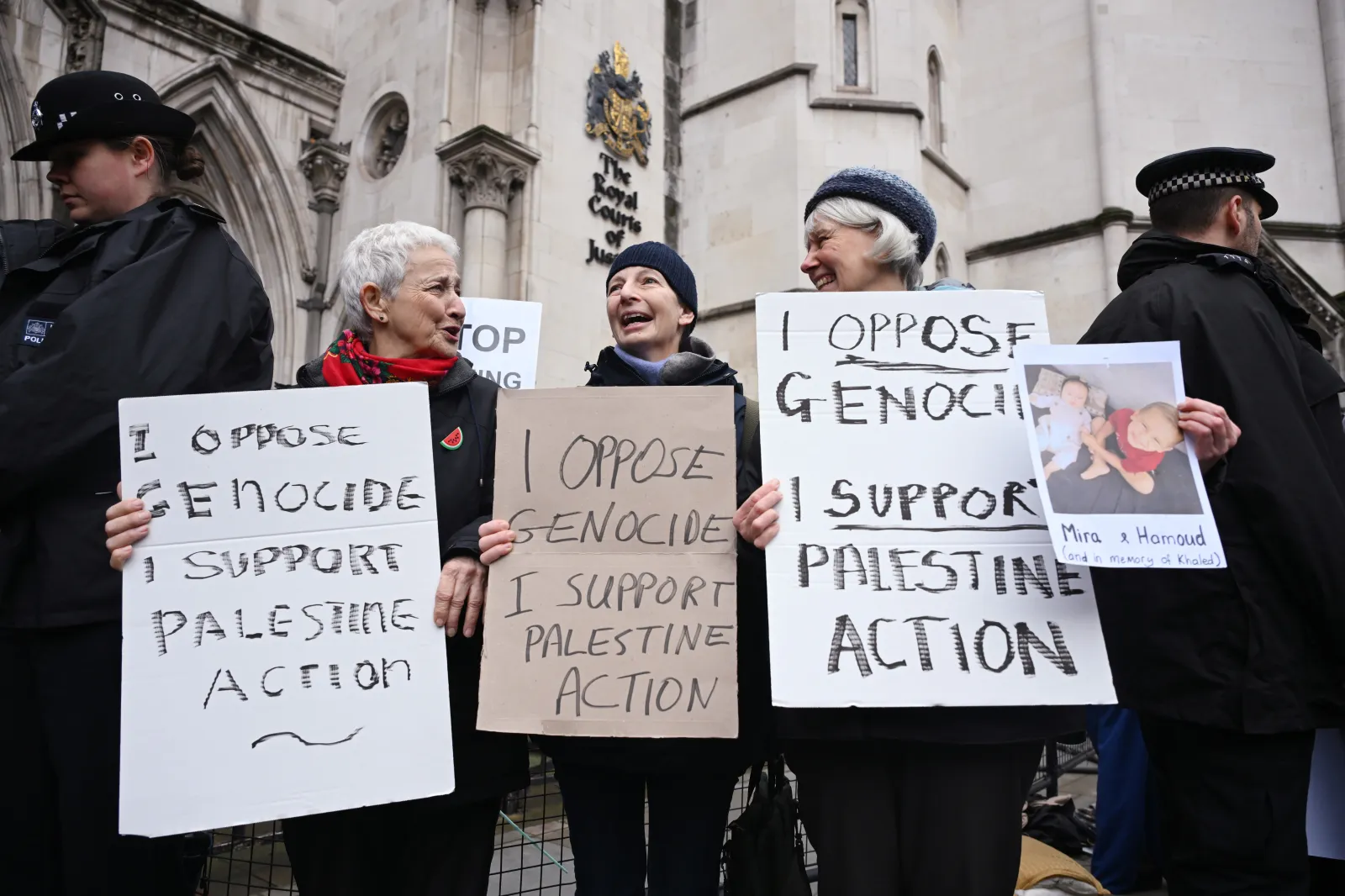 Demonstrators gather outside the High Court during a ruling on whether the government's ban of Palestine Action was unlawful on February 13, 2026, in London, United Kingdom.