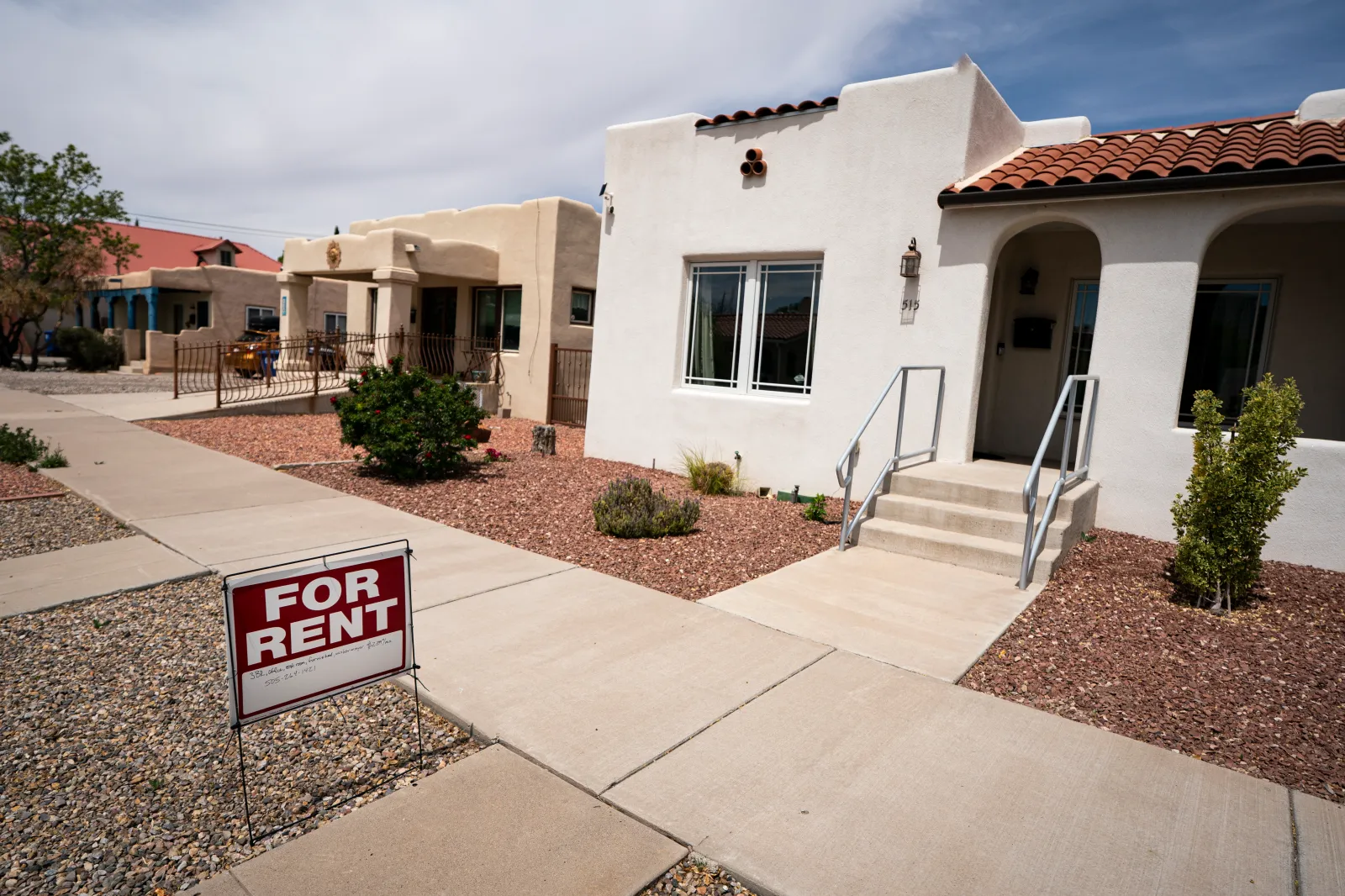 A real estate sign is seen outside a house in Albuquerque, New Mexico, on April 20, 2026.