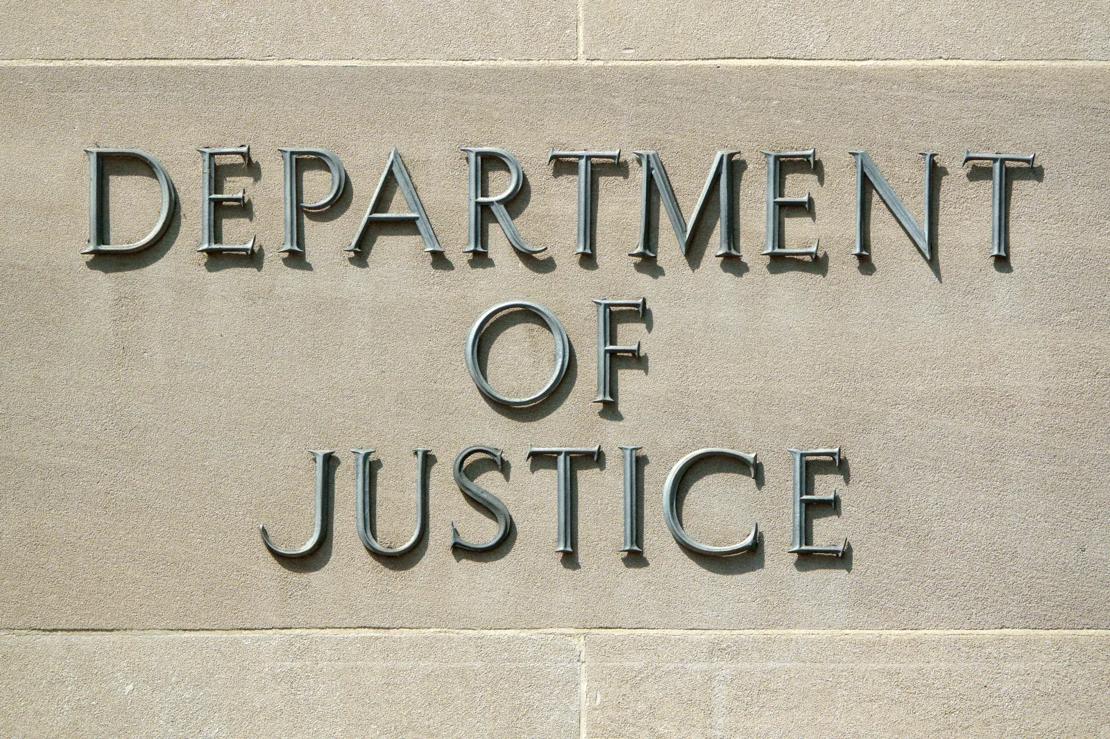 File Image: A sign is displayed outside of the Robert F. Kennedy U.S. Department of Justice (DOJ) building in Washington, D.C., on July 2, 2026.