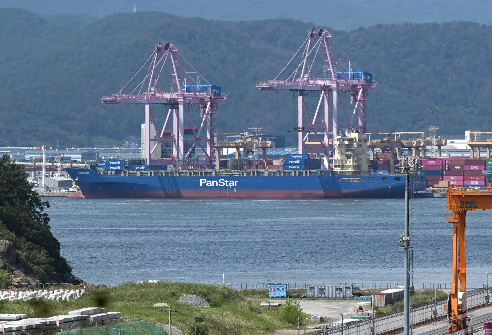 The container ship Panstar Acro anchored at Busan New Port in Busan on August 22, 2026, ahead of its Arctic voyage to Europe.