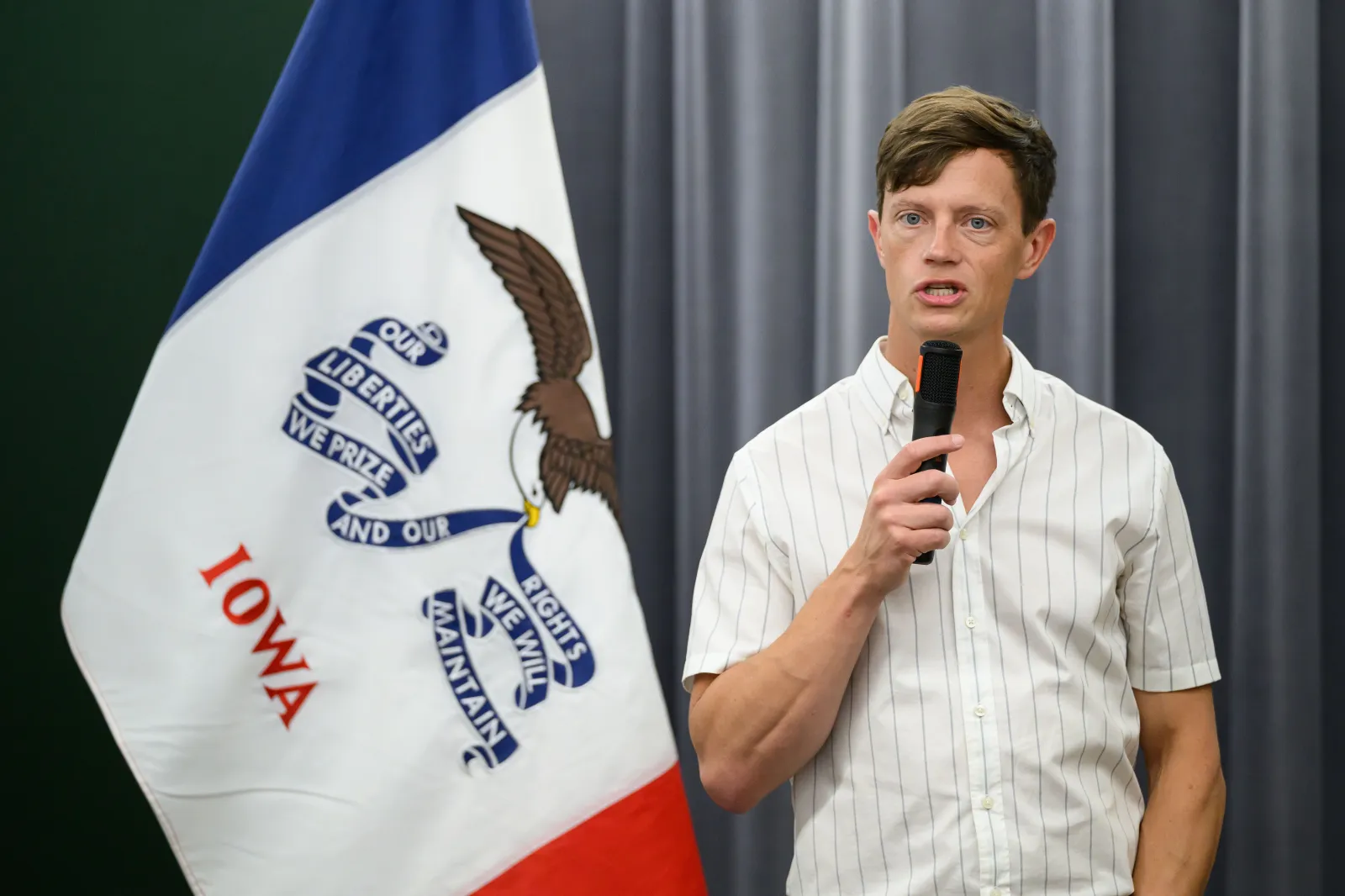 Democratic gubernatorial candidate Rob Sand speaks to voters during a campaign visit to the Montgomery County History Center on August 20, 2026, in Red Oak, Iowa. Sand's brother-in-law was killed on Thursday night.