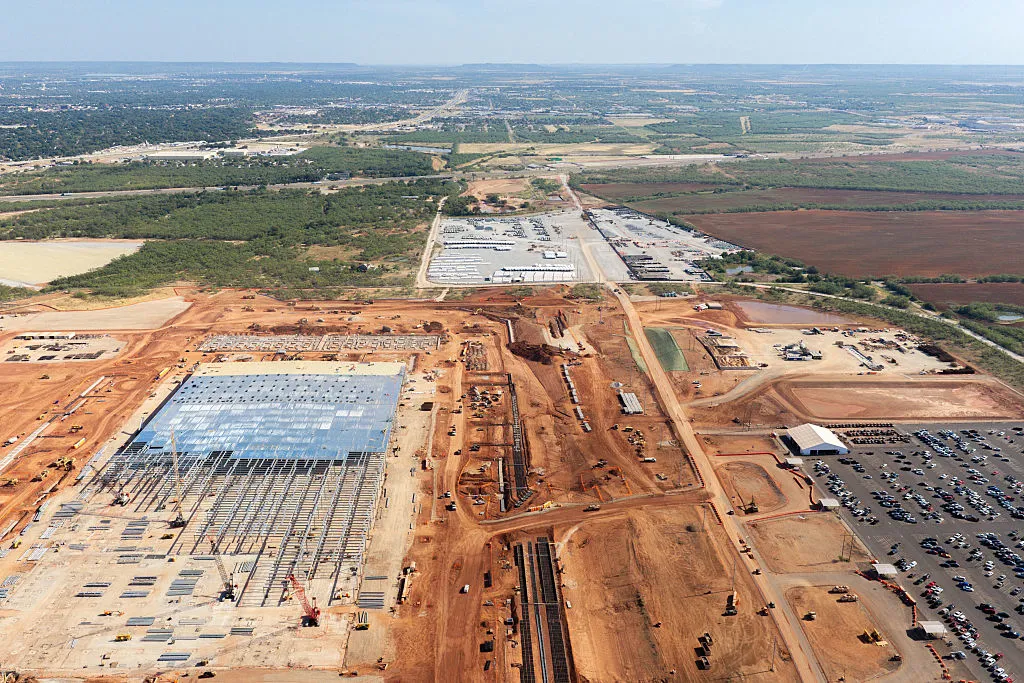 In an aerial view, sections of the Stargate Oracle AI data center undergo construction on August 26, 2026, in Abilene, Texas. The Stargate Oracle AI data center will span roughly 4 million square feet and will be operated by Oracle for OpenAI. The facility is the first Stargate site to go live and is expected to be fully completed by the end of 2026.