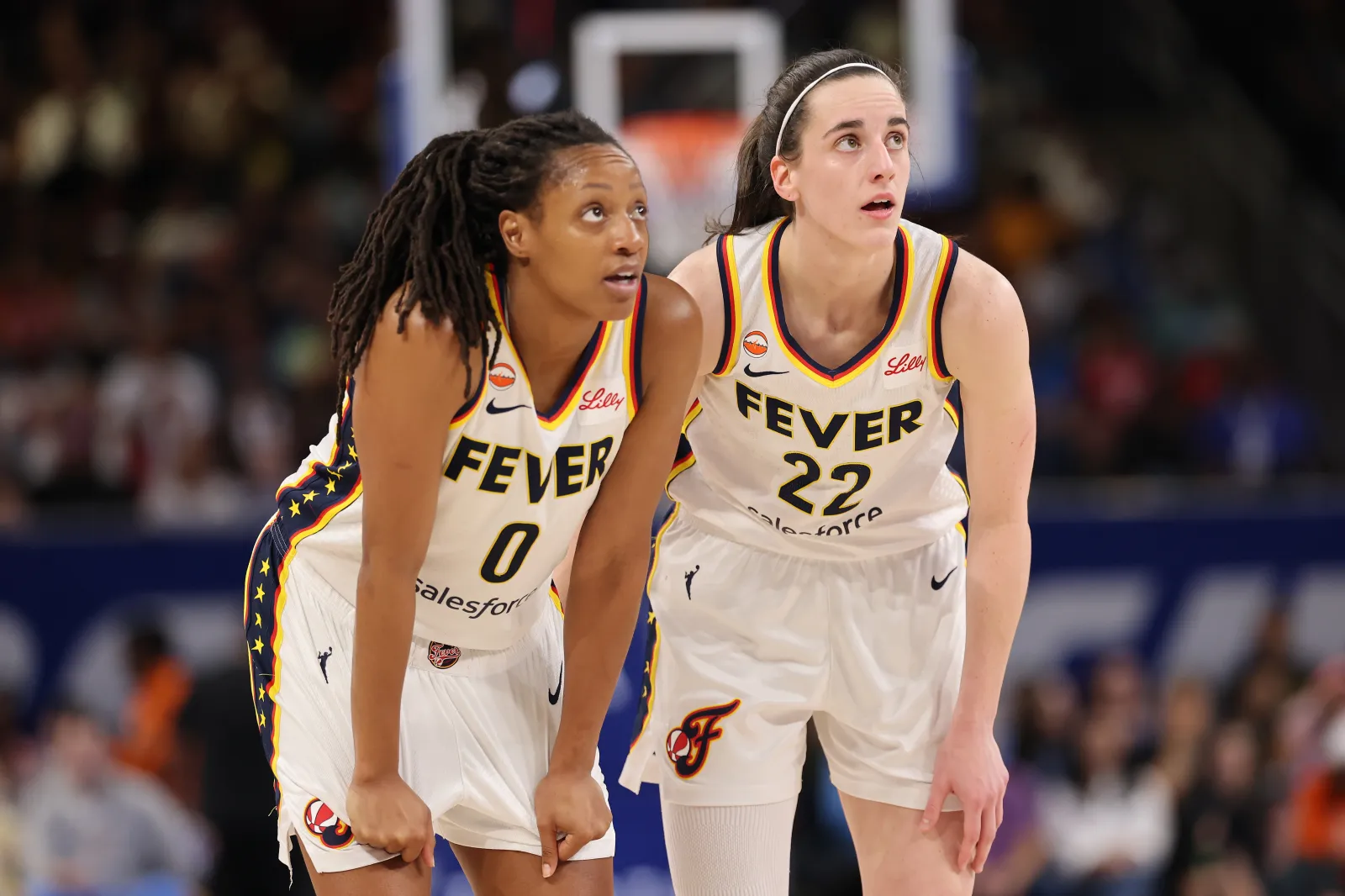 Indiana Fever teammates Kelsey Mitchell and Caitlin Clark during game against Chicago Sky