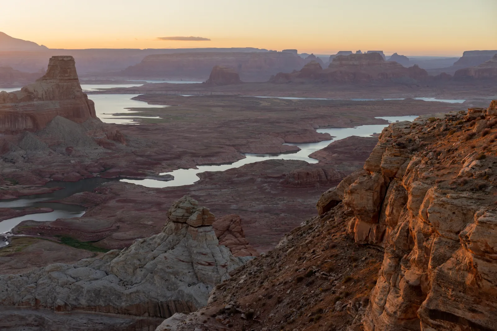 Land and geologic formations that have been underwater since the 1960s, when Lake Powell was created, reemerge for the first time while record low water levels continue to drop on September 4, 2026 near Page, Arizona.