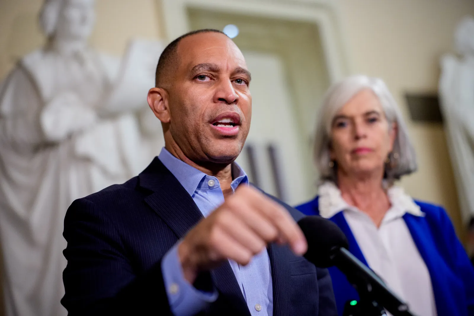 House Minority Leader Hakeem Jeffries (D-NY) accompanied by House Minority Whip Katherine Clark (D-MA) (R), speaks at a news conference at the U.S. Capitol in Washington, D.C., on September 17, 2026.