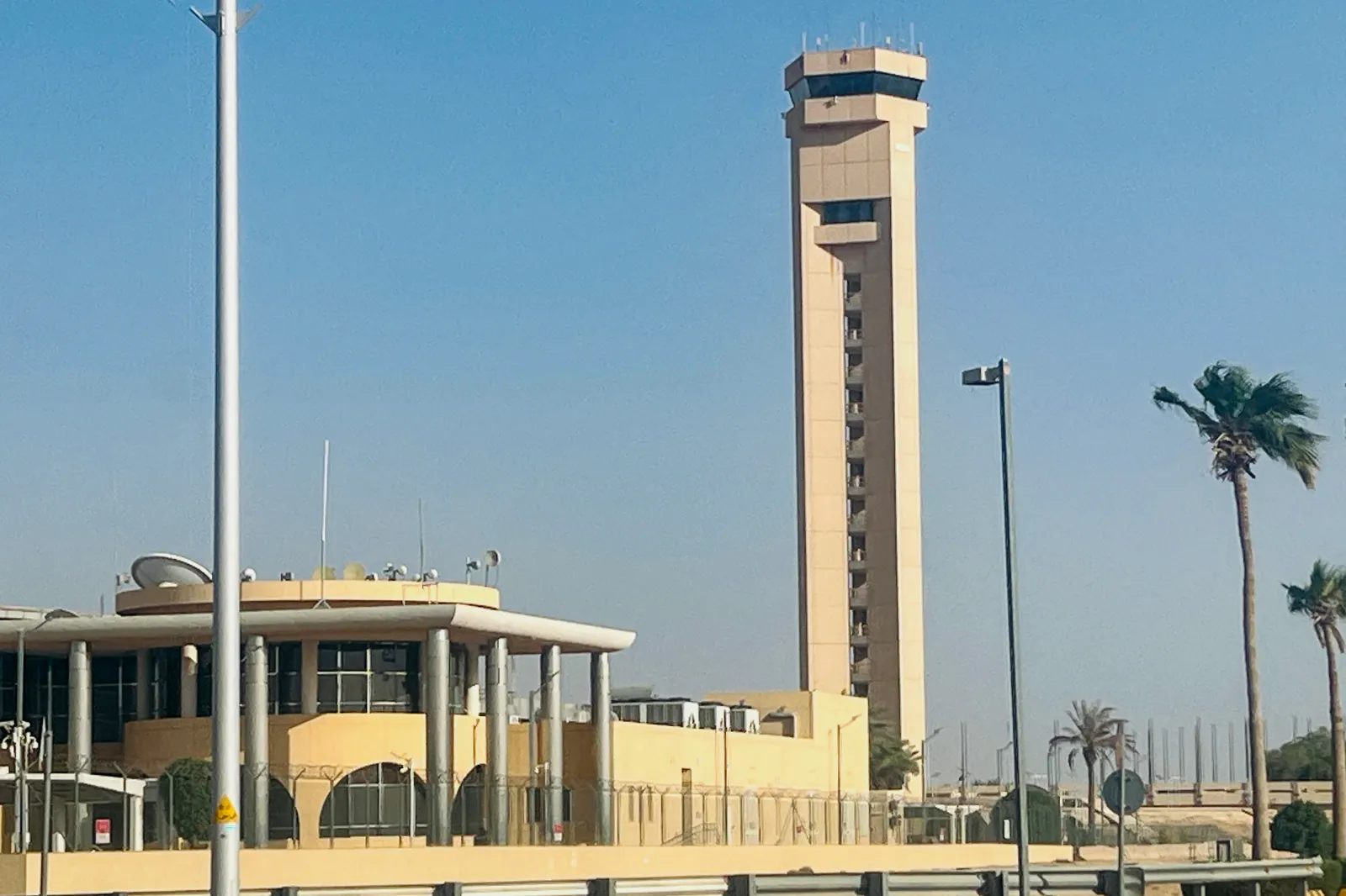 An air traffic control tower is seen at King Khalid International Airport in Riyadh on September 19, 2026. Black smoke and flames rose near the airport after Saudi authorities, fighting an escalating conflict with Yemen's Houthi authorities, issued an air raid alert.