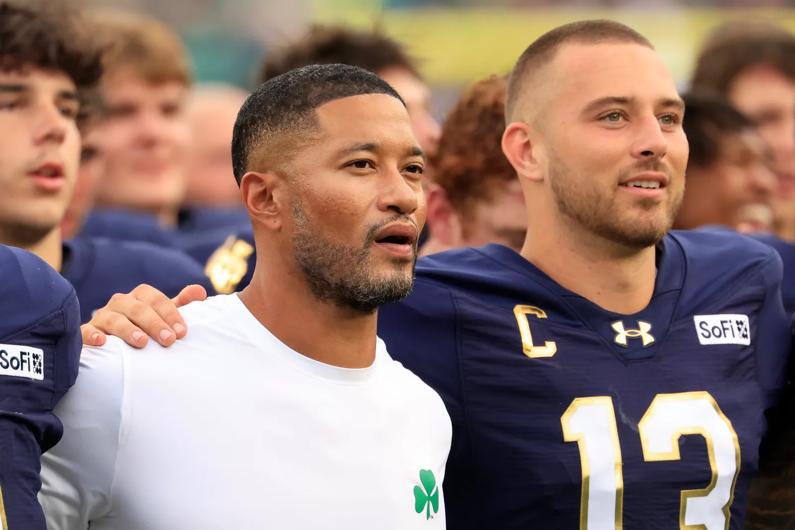 Head coach Marcus Freeman and CJ Carr #13 of the Notre Dame Fighting Irish.