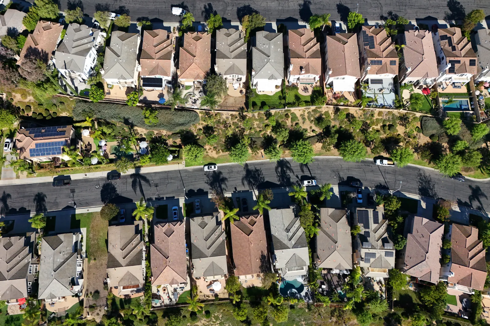 In an aerial view, two-story single family homes line the streets of a neighborhood on September 23, 2026 in Thousand Oaks, California.