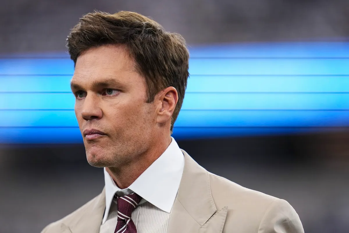 Tom Brady looks on during NFL game featuring the Commanders and Cowboys