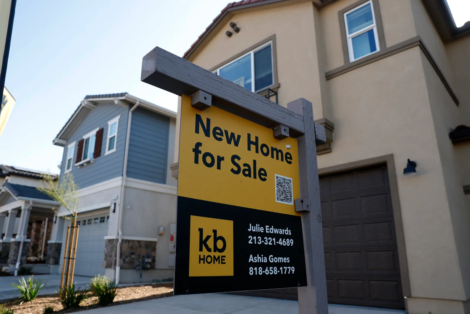 A for sale sign is posted in front of a new home on September 22, 2026, in Santa Clarita, California.