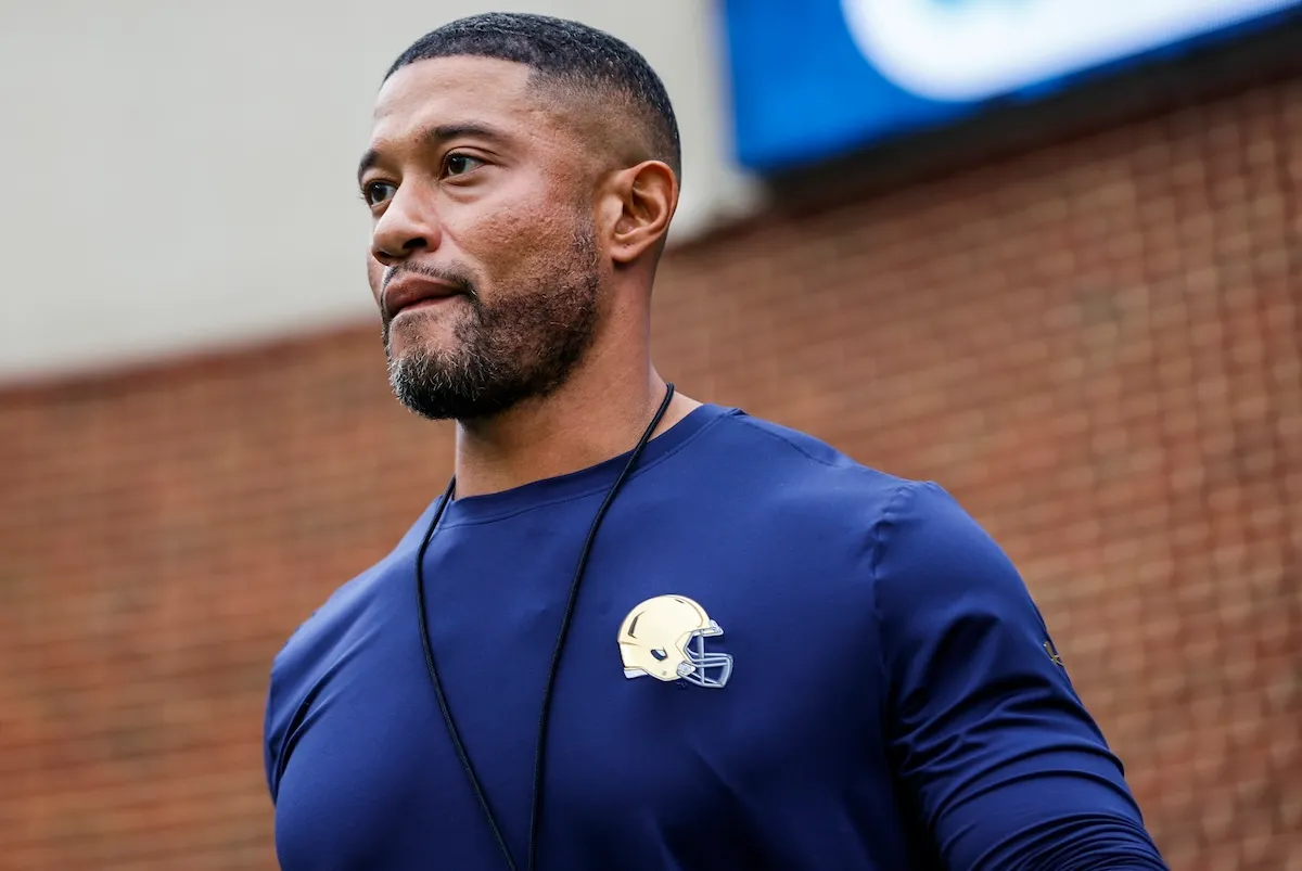 Notre Dame head coach Marcus Freeman goes on the field during warm ups before game against North Carolina