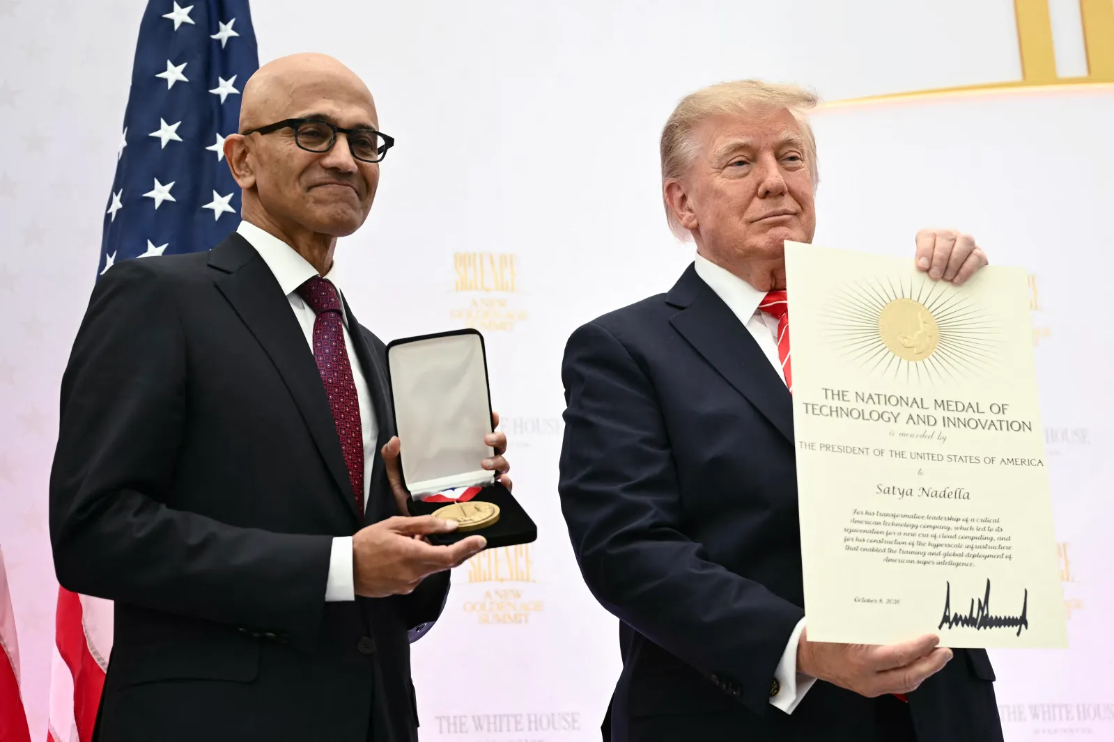 President Donald Trump presents the National Medal of Technology and Innovation to Microsoft CEO Satya Nadella during the "Golden Age of American Innovation Summit" at the Institute of Peace in Washington on October 8, 2026.