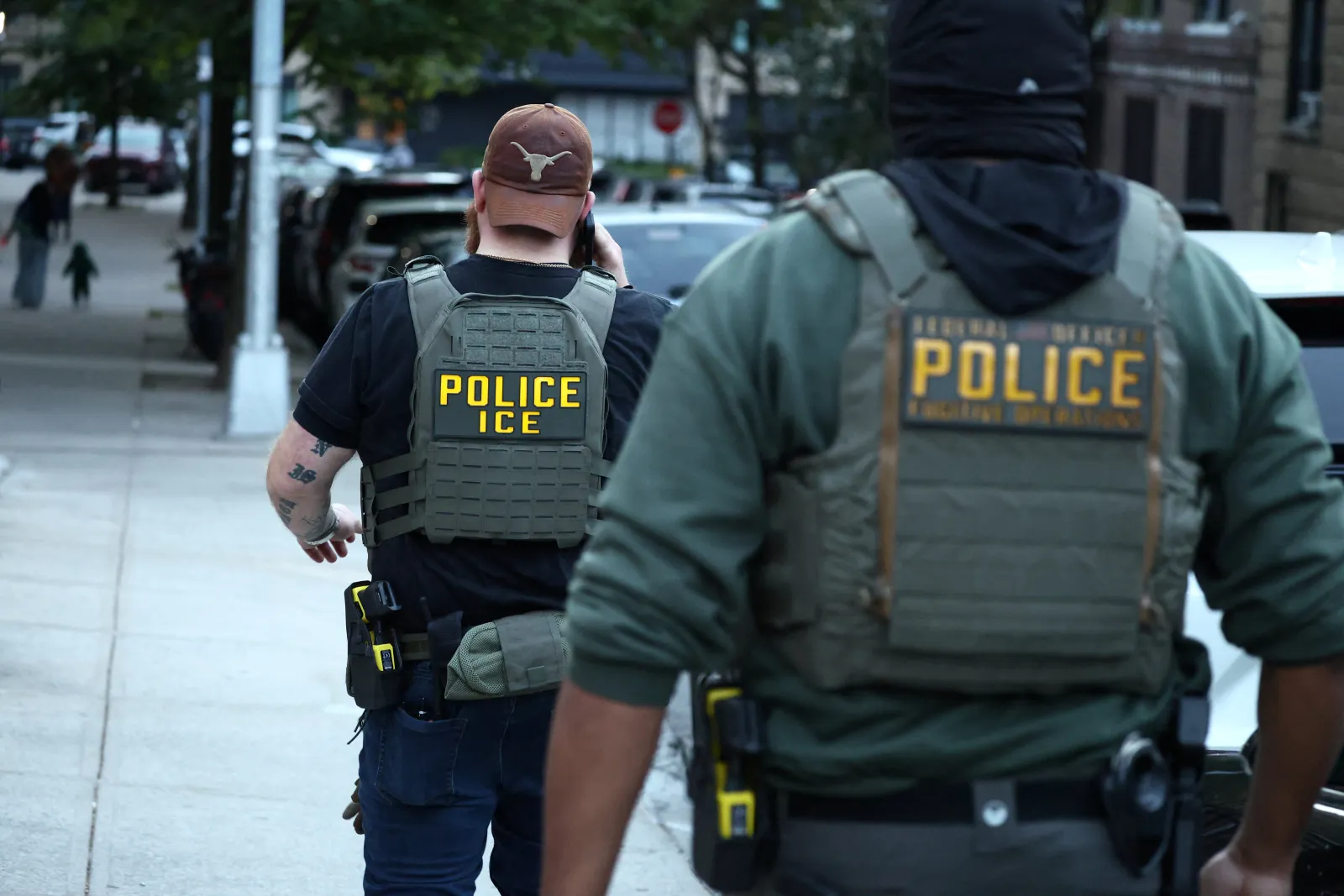 File photo: federal agents walk near the scene where a man was shot by an ICE officer in the Bronx borough, New York, October 8, 2026.