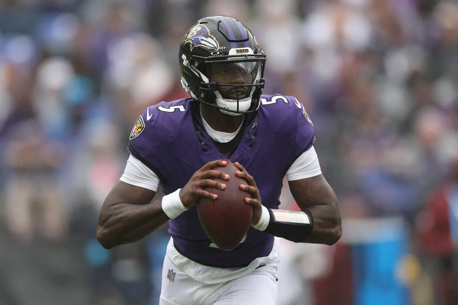 BALTIMORE, MARYLAND - OCTOBER 04: Quarterback Tyler Huntley #5 of the Baltimore Ravens looks to pass the ball against the Tennessee Titans at M&T Bank Stadium o