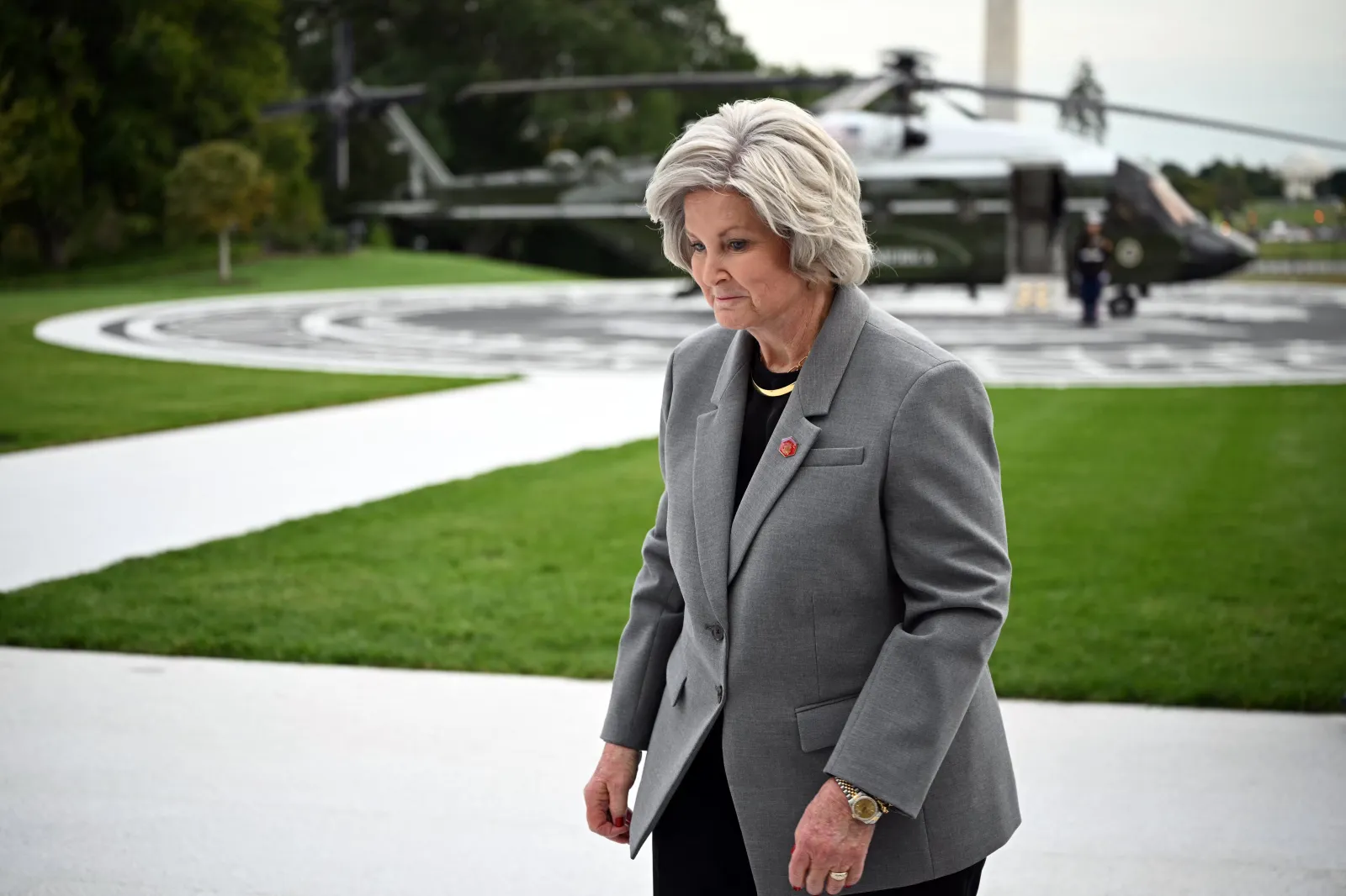 White House chief of staff Susie Wiles is seen as President Donald Trump departs from the White House South Lawn on October 9, 2026.