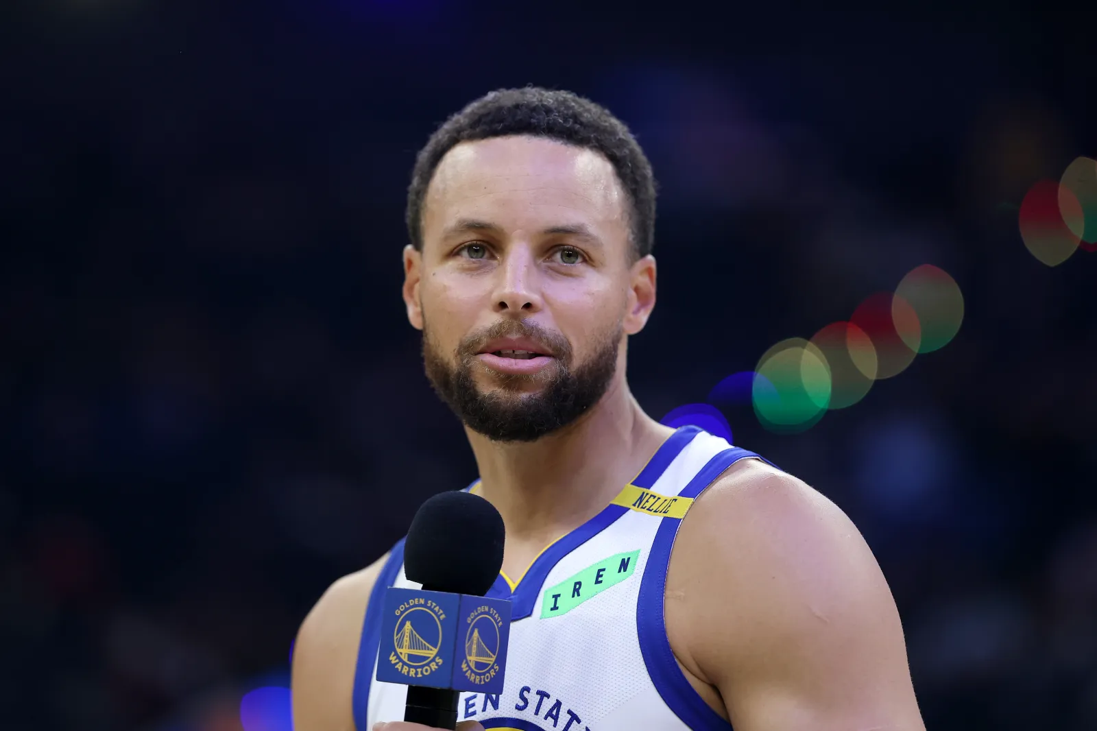 Warriors star Stephen Curry speaks to the crowd before game against Lakers