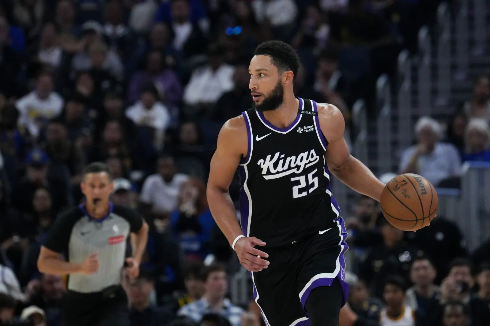 Ben Simmons #25 of the Sacramento Kings moves with the ball during the first half of the preseason game against the Golden State Warriors at Chase Center on October 10, 2026 in San Francisco, California. (Photo by Godofredo A. Vásquez/Getty Images)