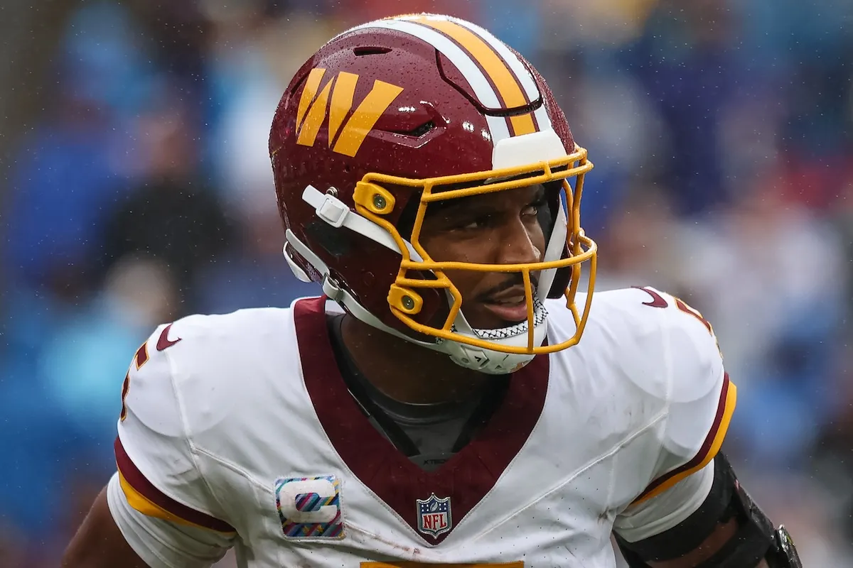 Commanders QB Jayden Daniels looks on against New York Giants