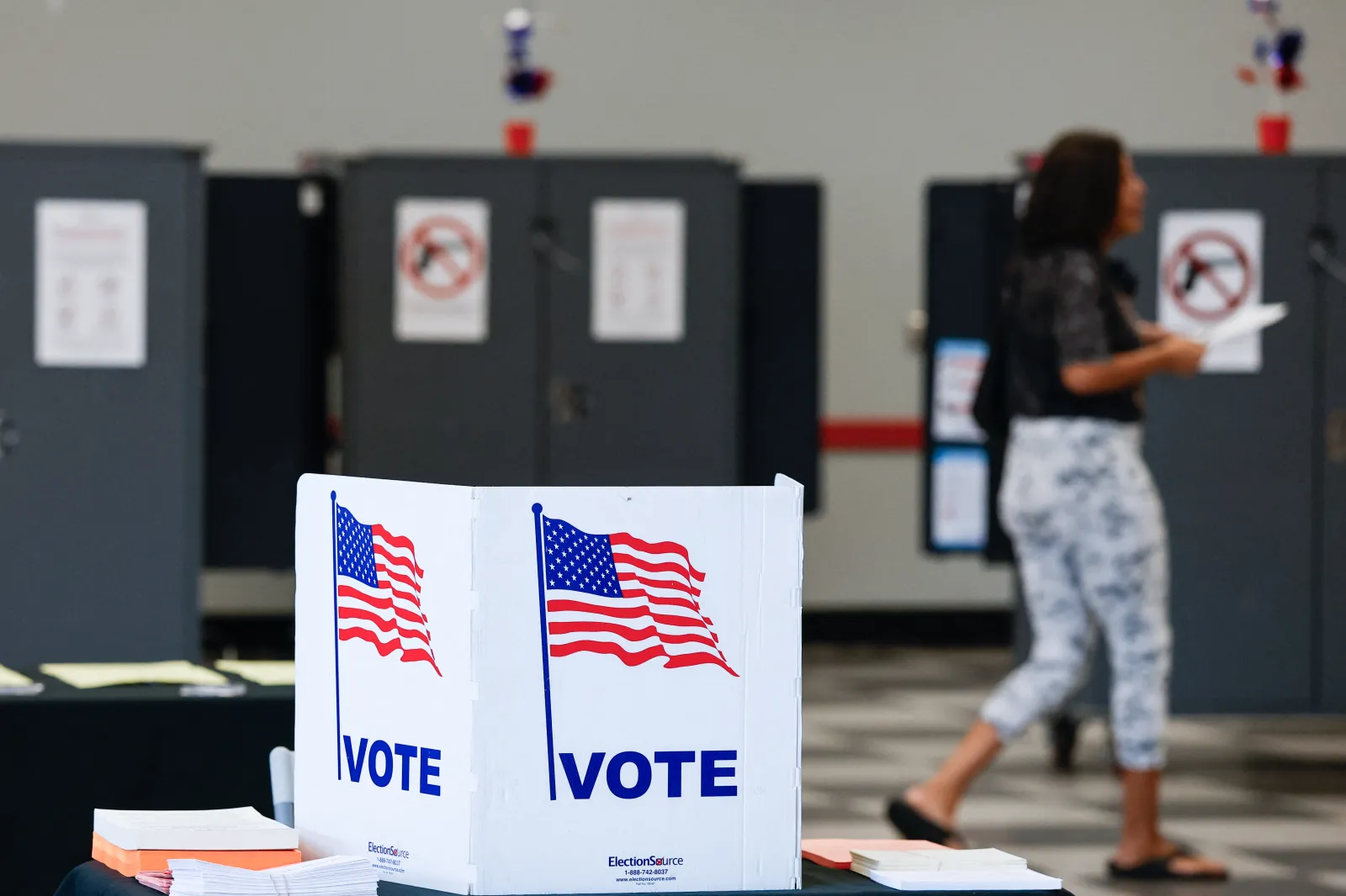 People vote at a polling location during early voting in the midterm election, in Atlanta, Georgia, on October 13, 2026.