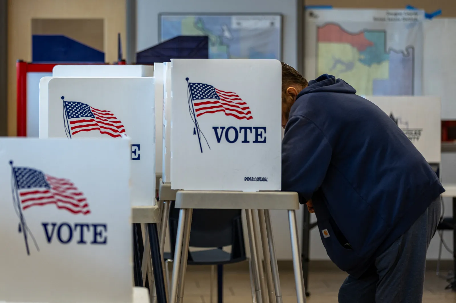 A Kansas resident fills out his ballot for the midterms on the first day of in-person voting at the Douglas County Clerk Election Office in Lawrence, Kansas on October 14, 2026.