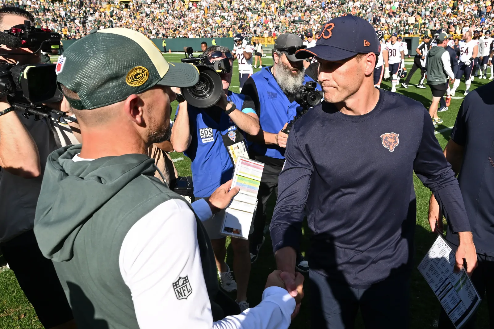Green Bay Packers head coach Matt LaFleur and Chicago Bears head coach Ben Johnson