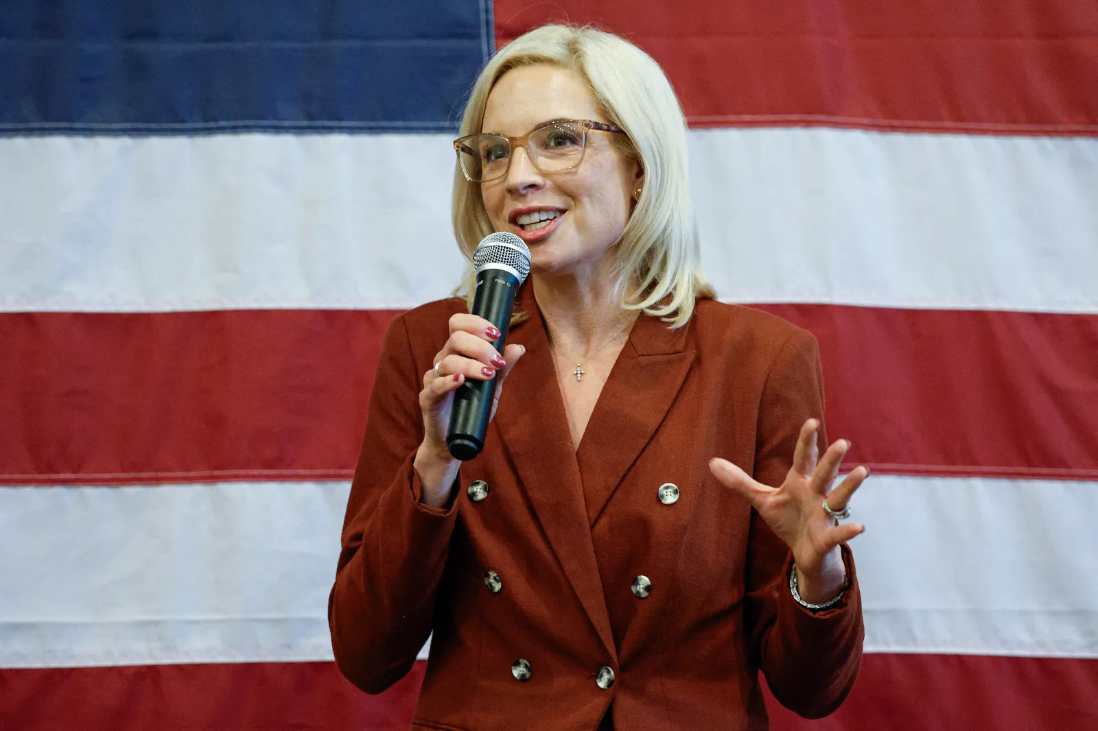 Iowa Senate candidate Ashley Hinson speaks at a campaign stop. Earlier this week, she asked for gas money for her campaign bus.