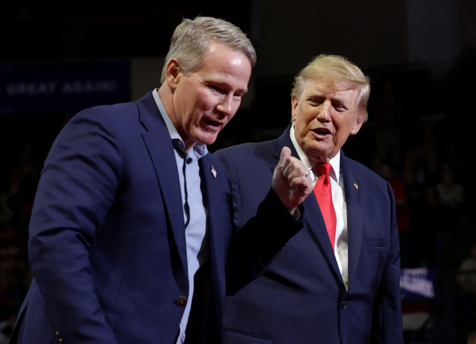 U.S. President Donald Trump (R) and U.S. Sen. Jon Husted (R-OH) appear on stage together during an election rally at the Covelli Center on October 12, 2026, in Youngstown, Ohio. (Photo by Alex Wong/Getty Images)
