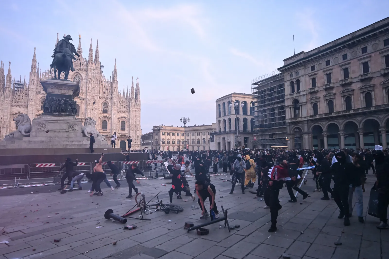 Demonstrators clash with Police during an anti-government protest organized by the Italia in Piazza movement, at Piazza Duomo in Milan, on October 17, 2026.