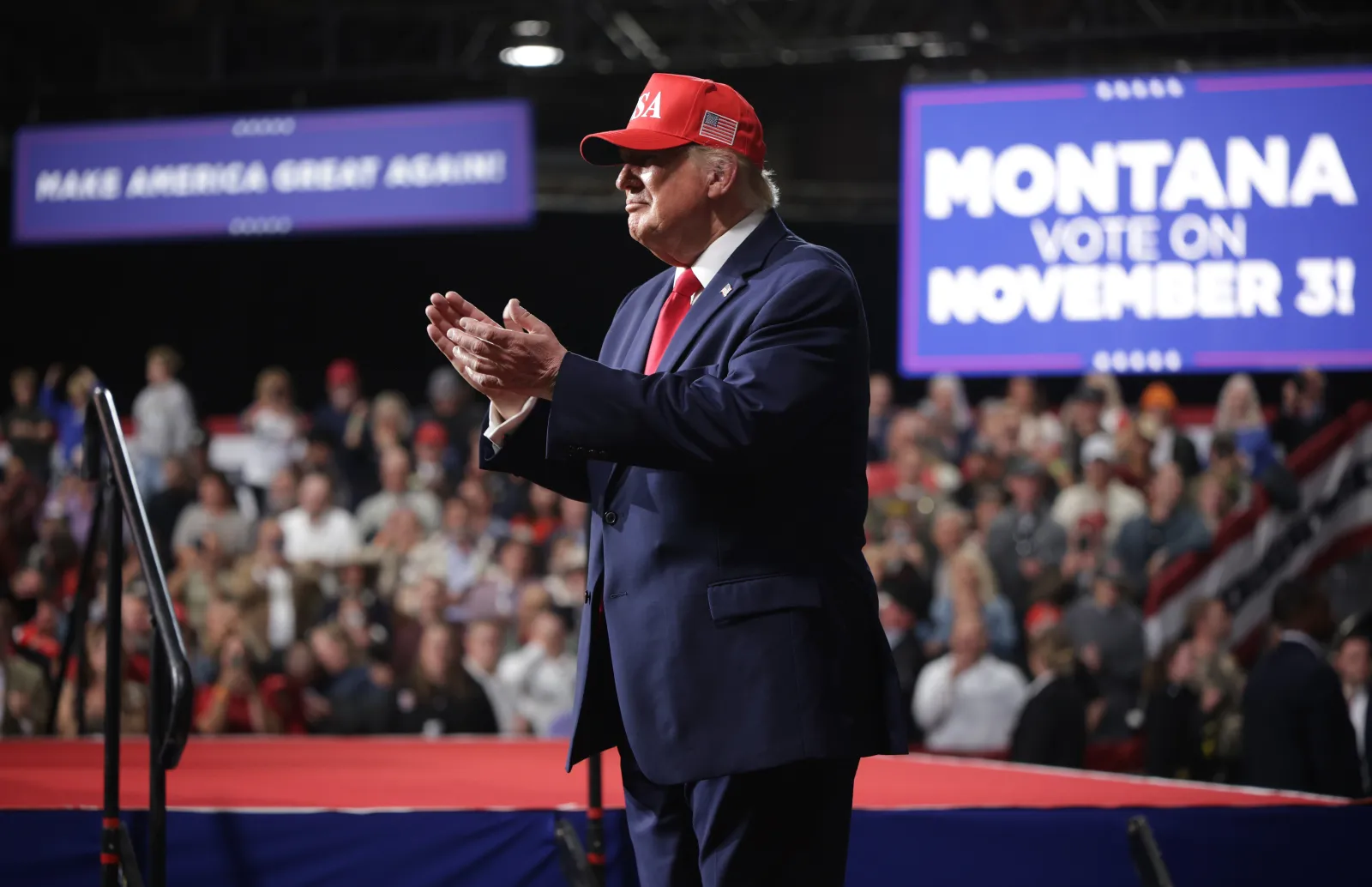 President Donald Trump applauds during an election rally at Majestic Valley Arena on Wednesday in Kalispell, Montana. (Photo by Alex Wong/Getty Images)