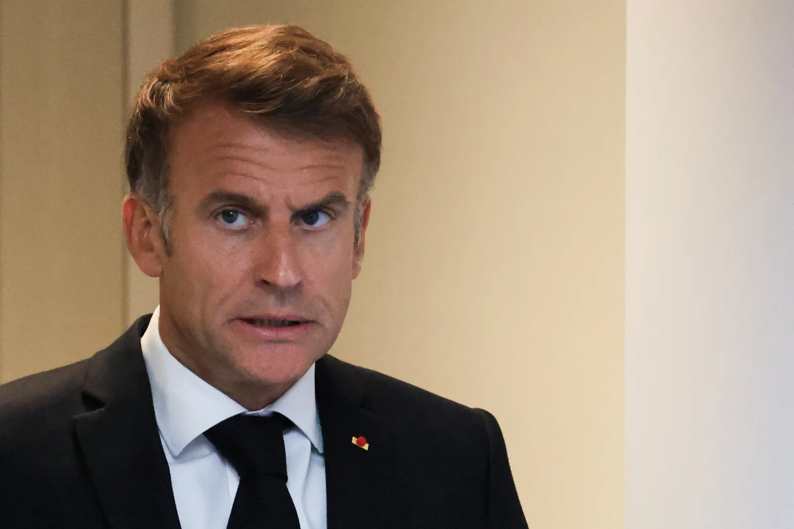 France's President Emmanuel Macron reacts as he chairs an Interministerial Crisis Meeting at the Elysee Presidential Palace, in Paris, on October 18, 2026 the day after riots and looting on the sidelines of nationwide protests against the "high cost of living."
