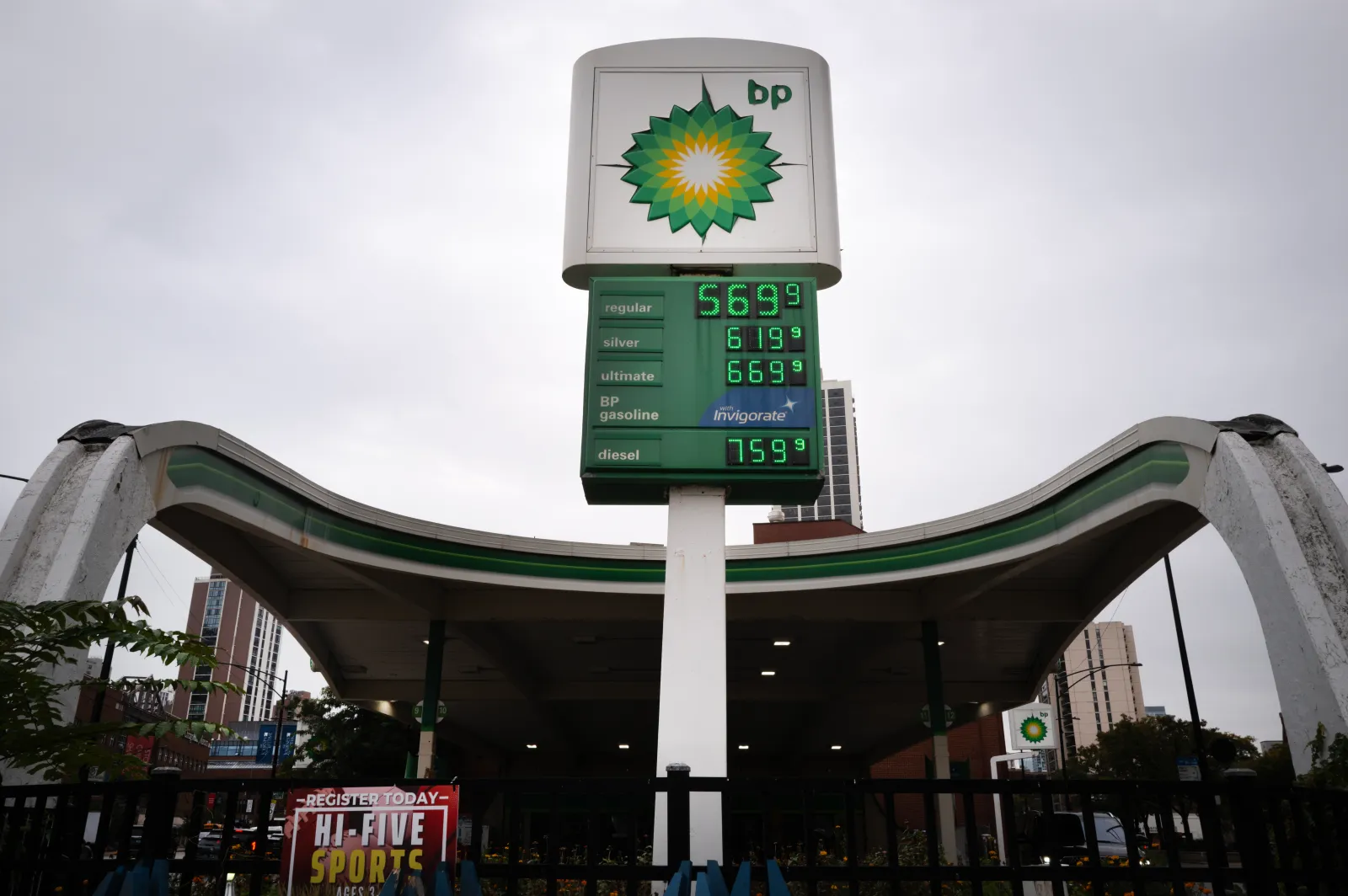 Gas prices are displayed at a station on October 15, 2026, in Chicago.