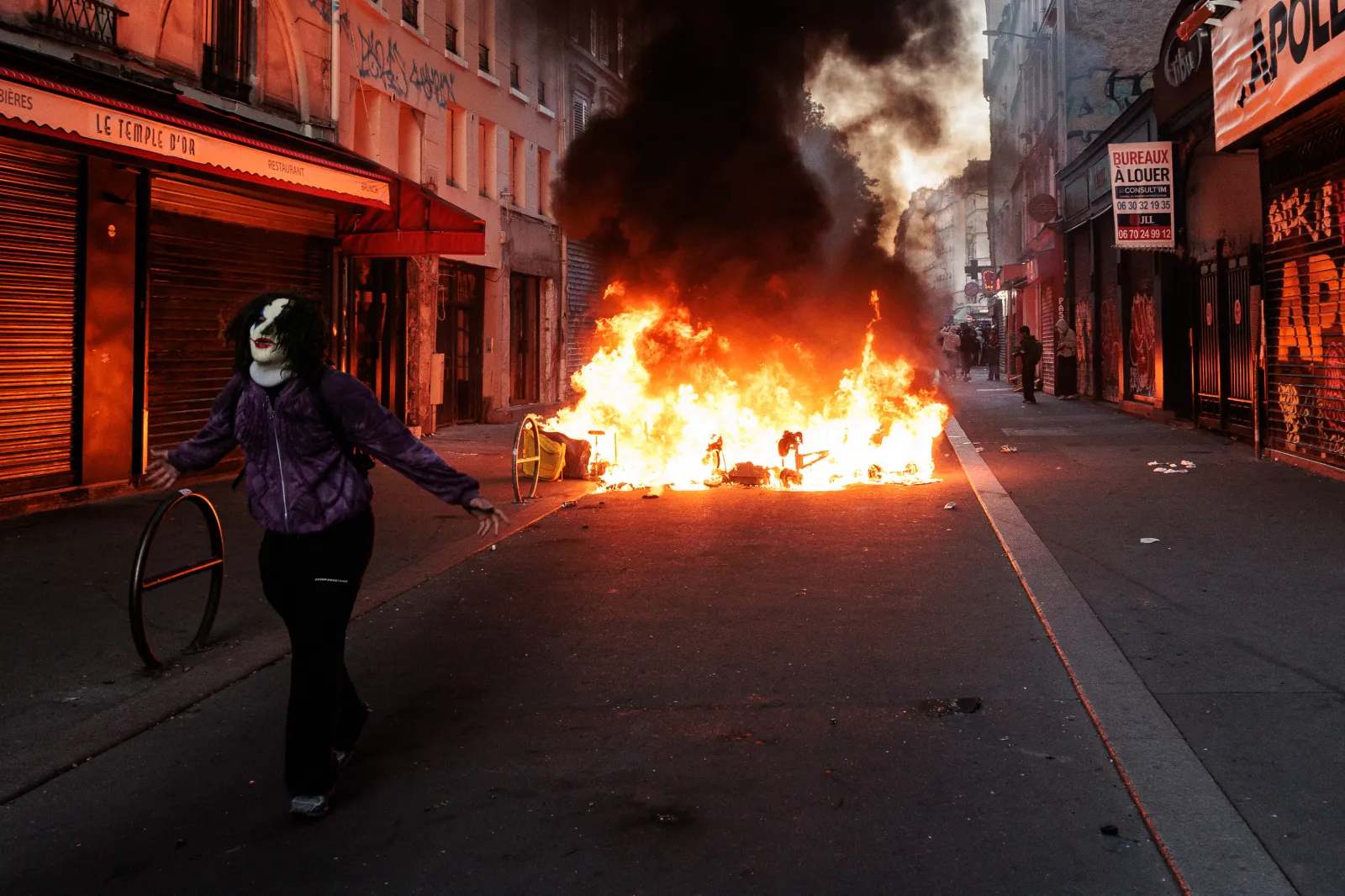 Several fires broke out during an unauthorized demonstration, marked by riots and clashes with law enforcement, near Place de la Republique in Paris, Ile-de-France, France, on Sunday. (Gauthier Bedrignans/Hans Lucas/AFP via Getty Images)